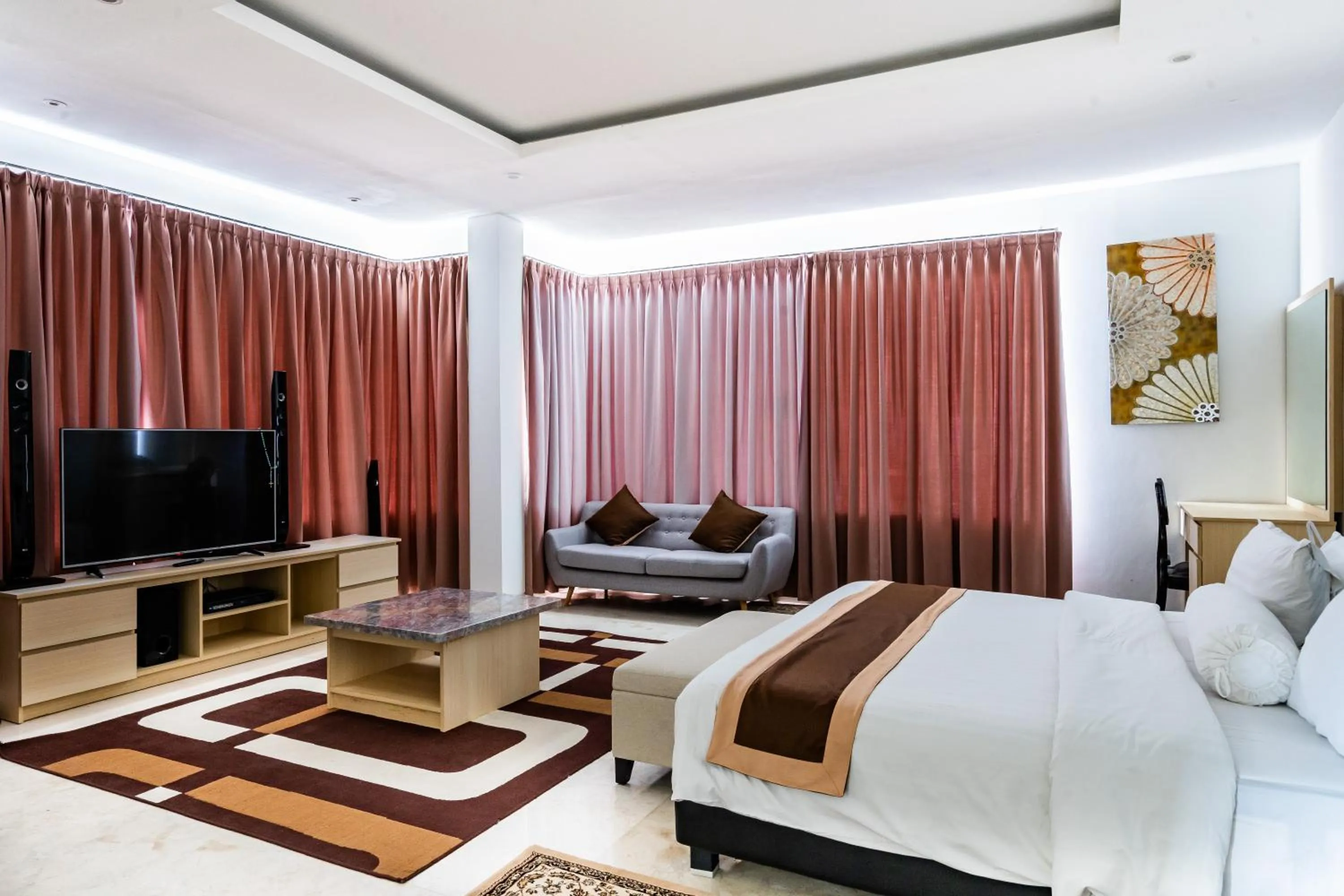 Communal lounge/ TV room, Bed in Bali Residence Villa