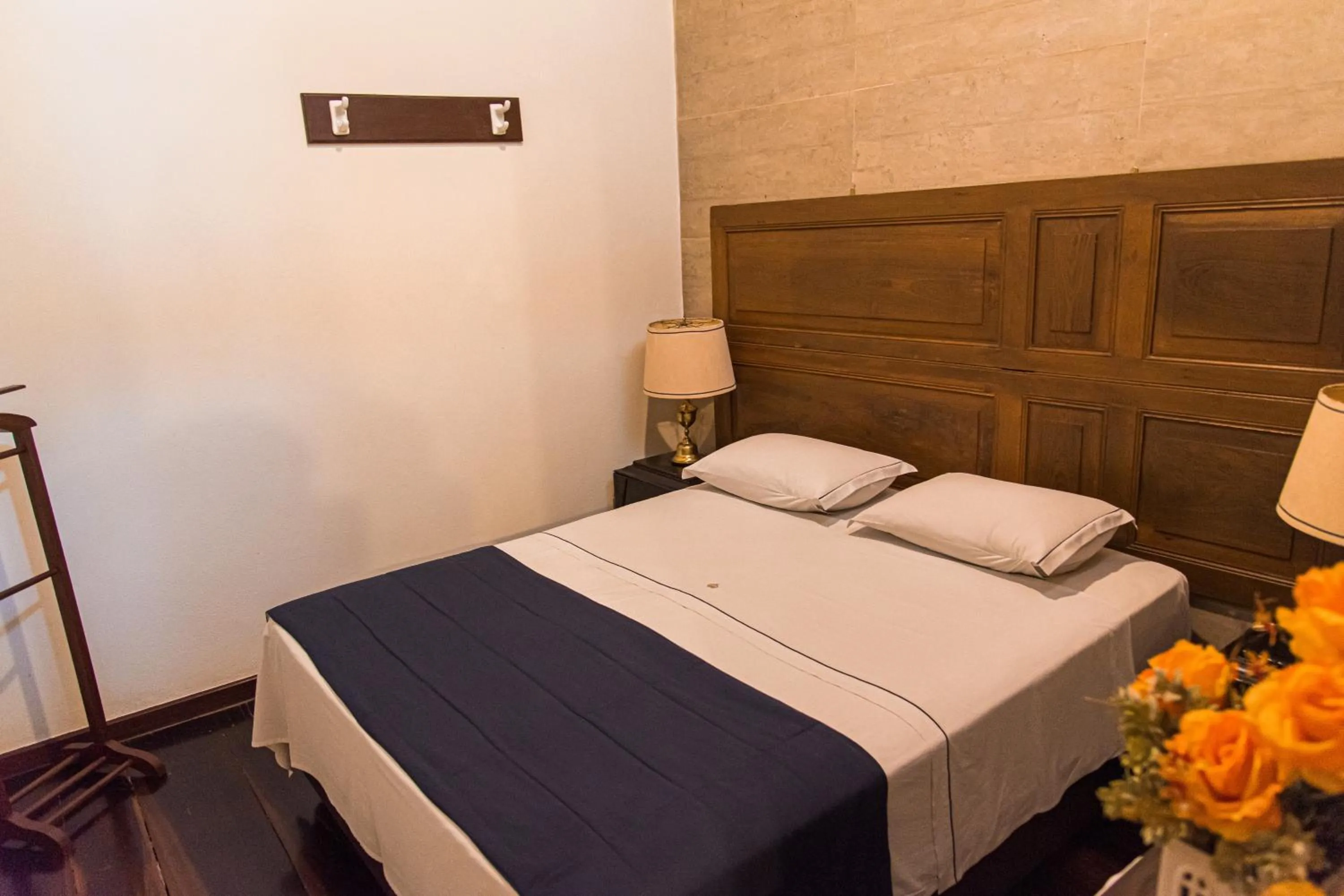 Bed in Pousada Dom Petrópolis