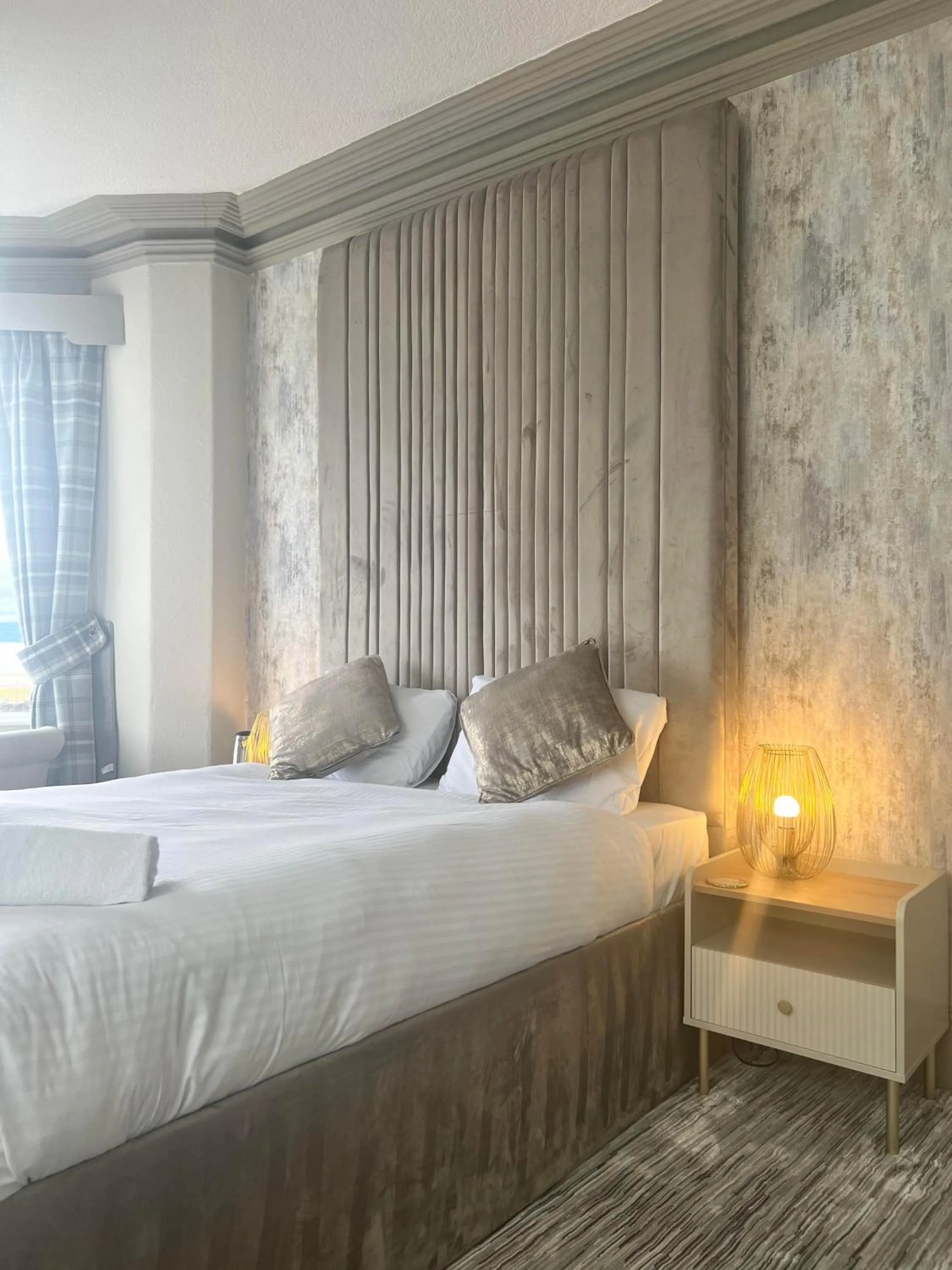 Bed in The Commodore Inn