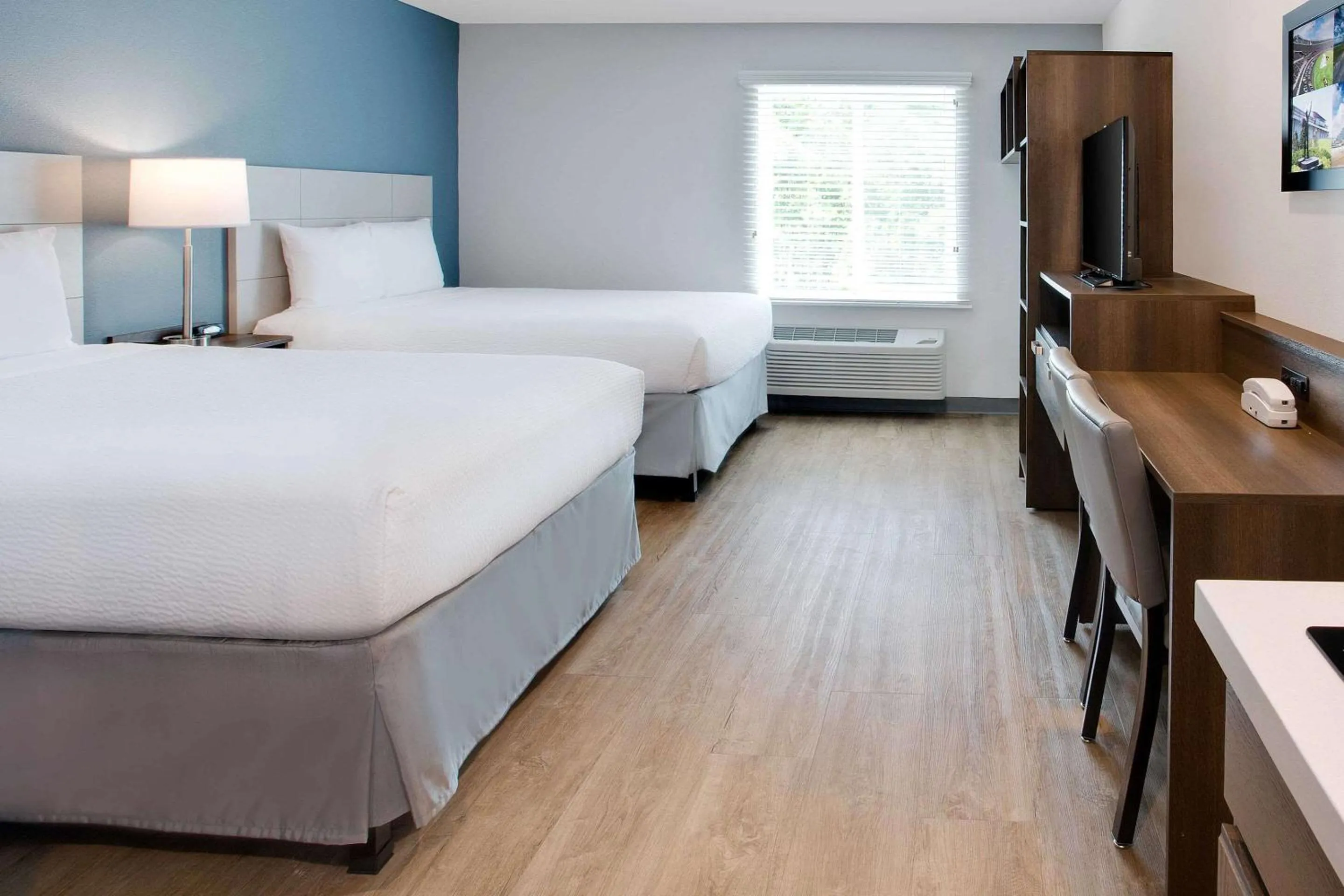 Photo of the whole room, Bed in WoodSpring Suites Daytona Beach Int'l Speedway