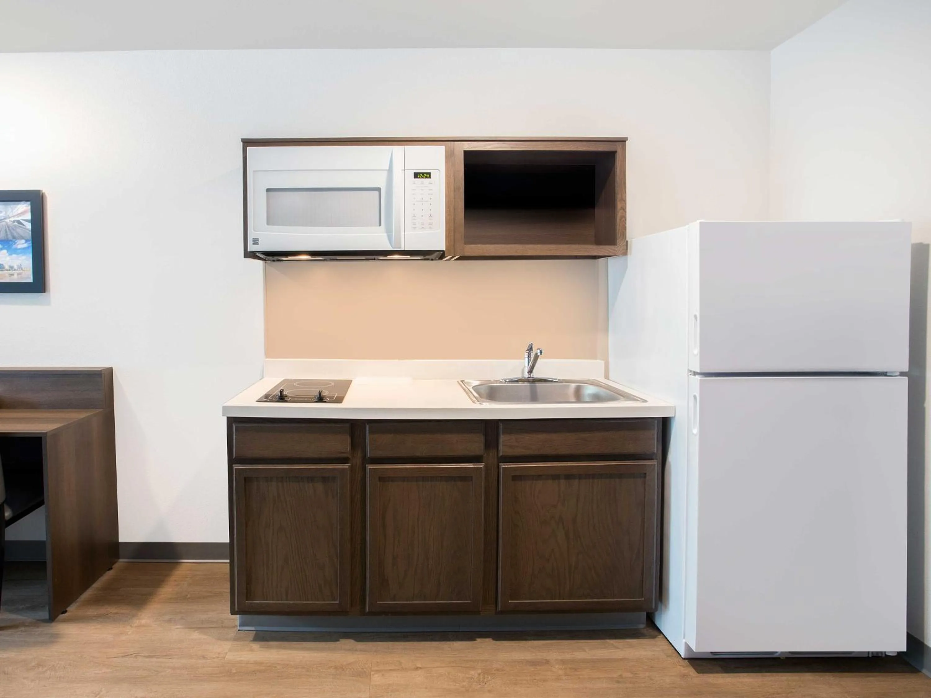 Kitchen or kitchenette in WoodSpring Suites Daytona Beach Int'l Speedway