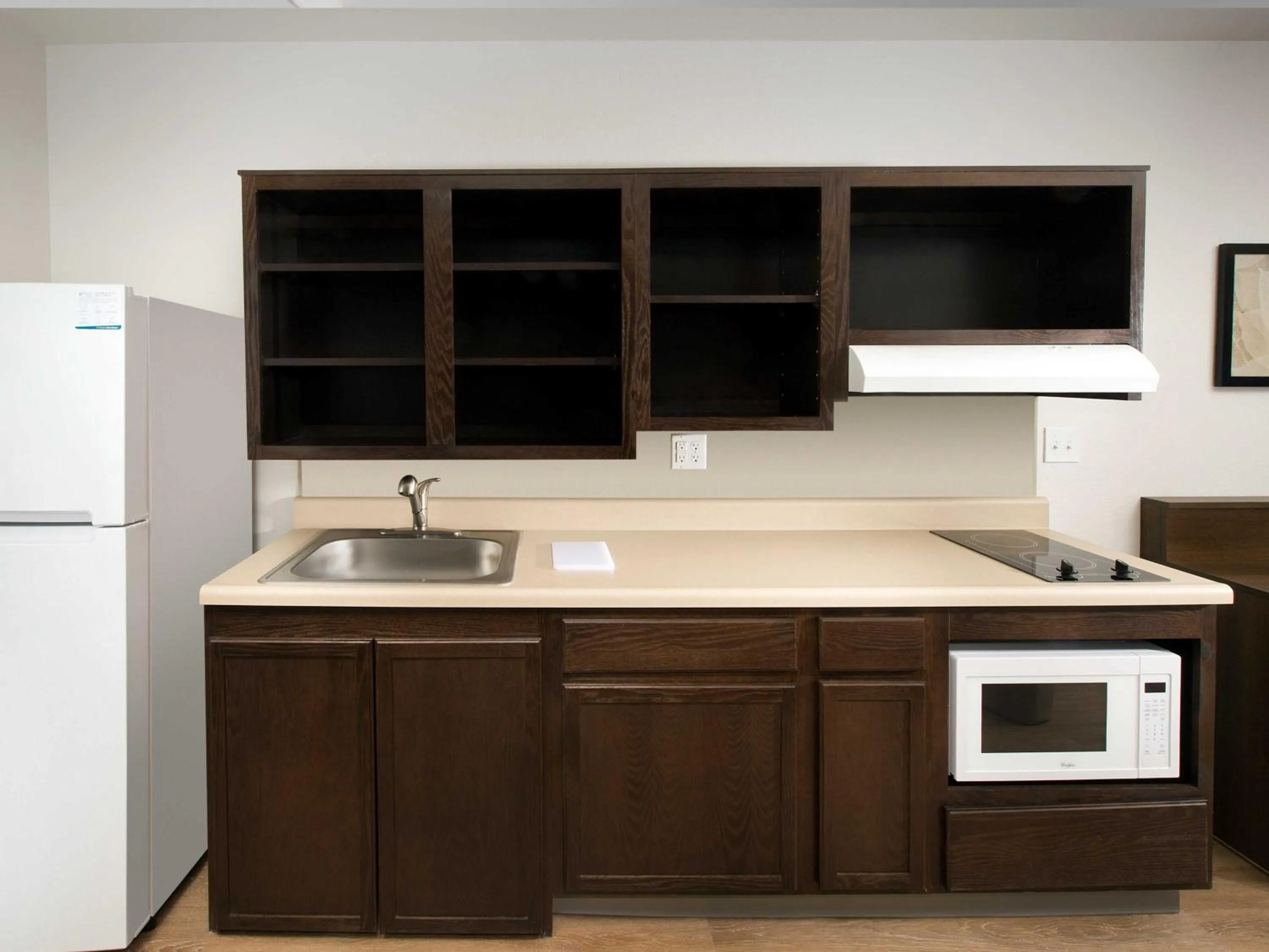 Kitchen or kitchenette in WoodSpring Suites Daytona Beach Int'l Speedway