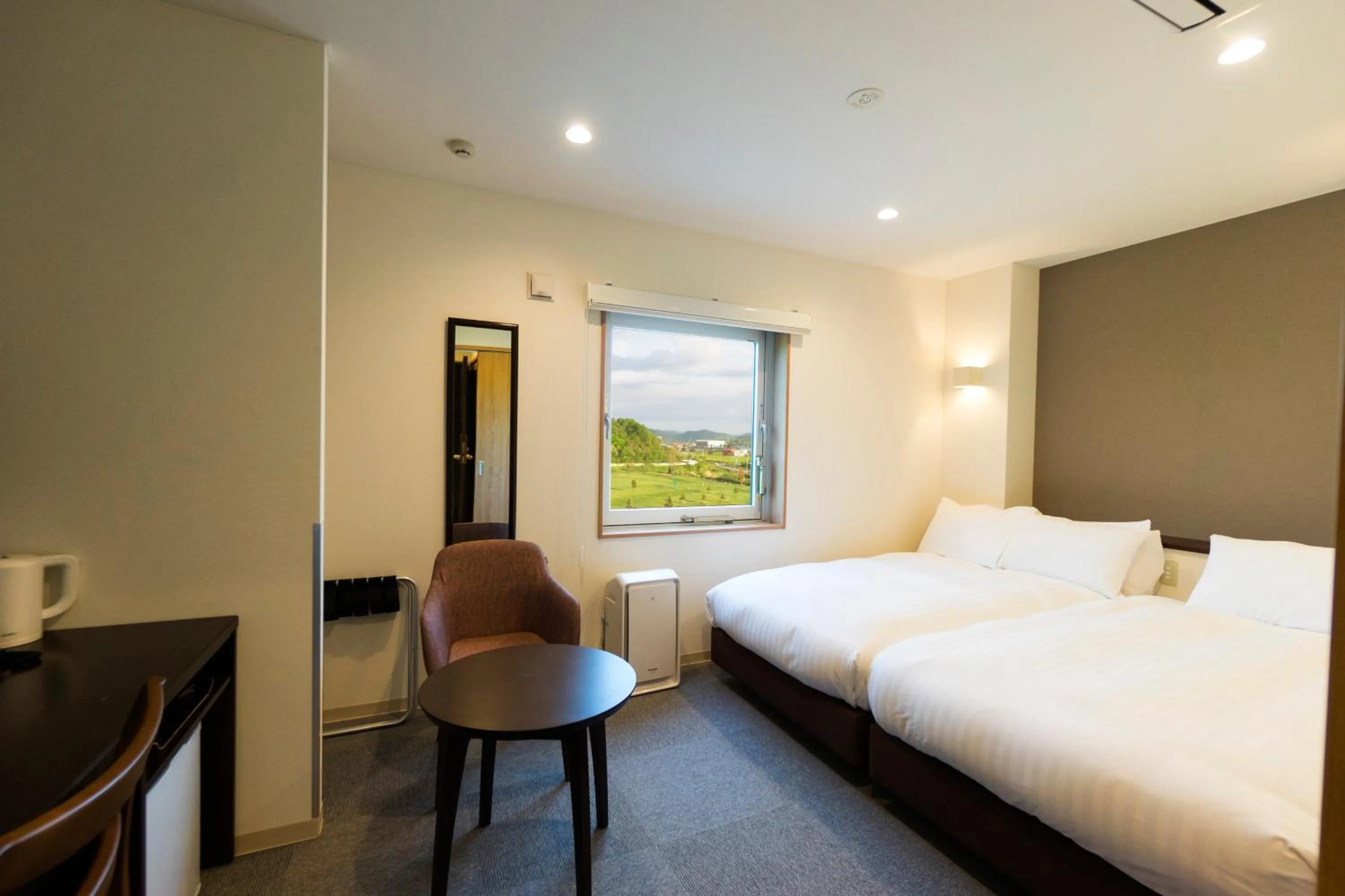 Bed in Mikasa Tennen Onsen Taikonoyu Sparesort Hotel Taiko Bettei Hatago