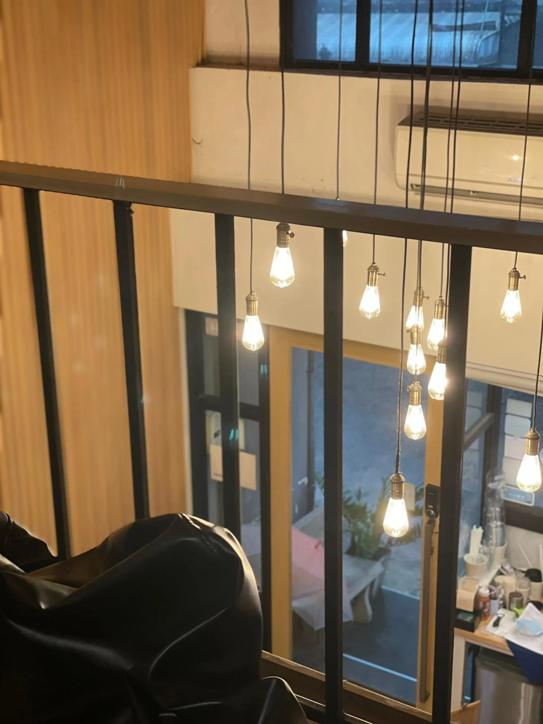 Seating area in ORA Hostel Bangkok