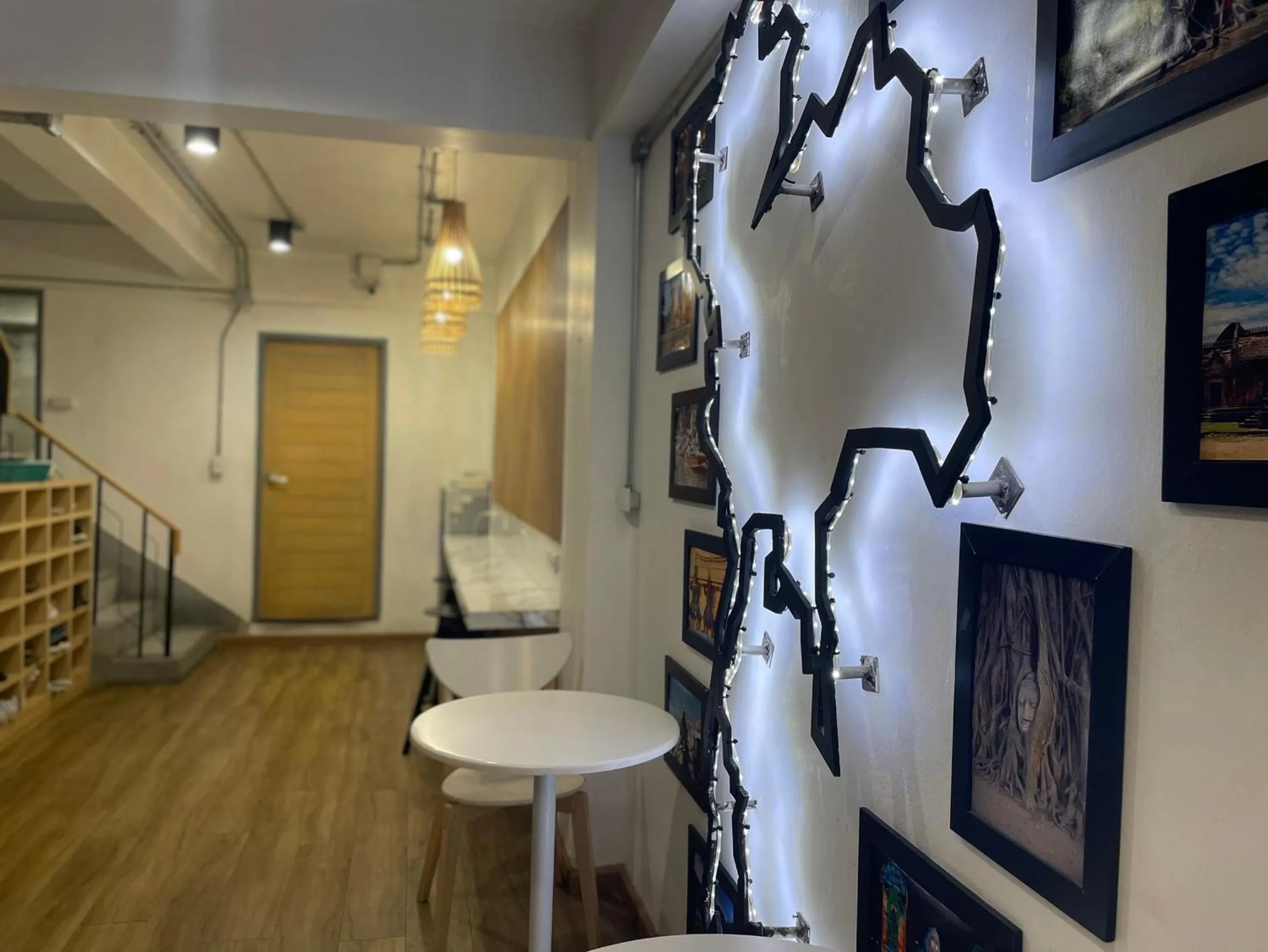 Seating area in ORA Hostel Bangkok