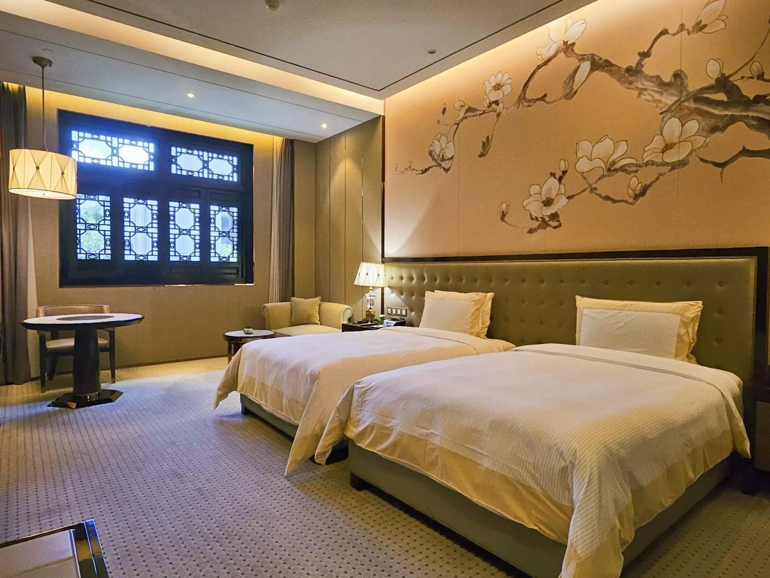 Photo of the whole room, Bed in Royal Garden Hotel Shanghai-Free Shuttle to and From Disney & PVG & close Metro Line2 easy to SHA New Expo