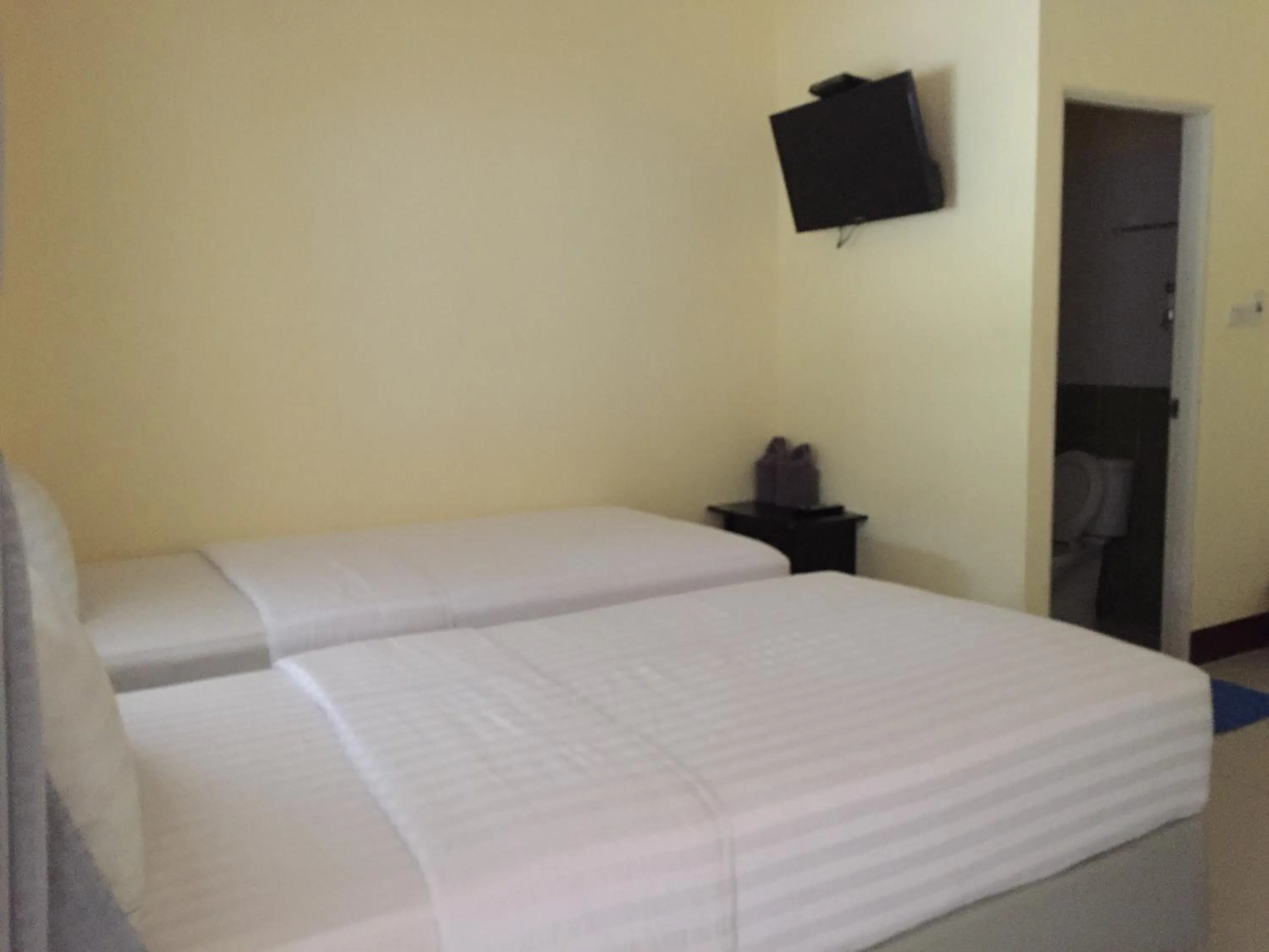 Photo of the whole room, Bed in Bannrommai Sattahip