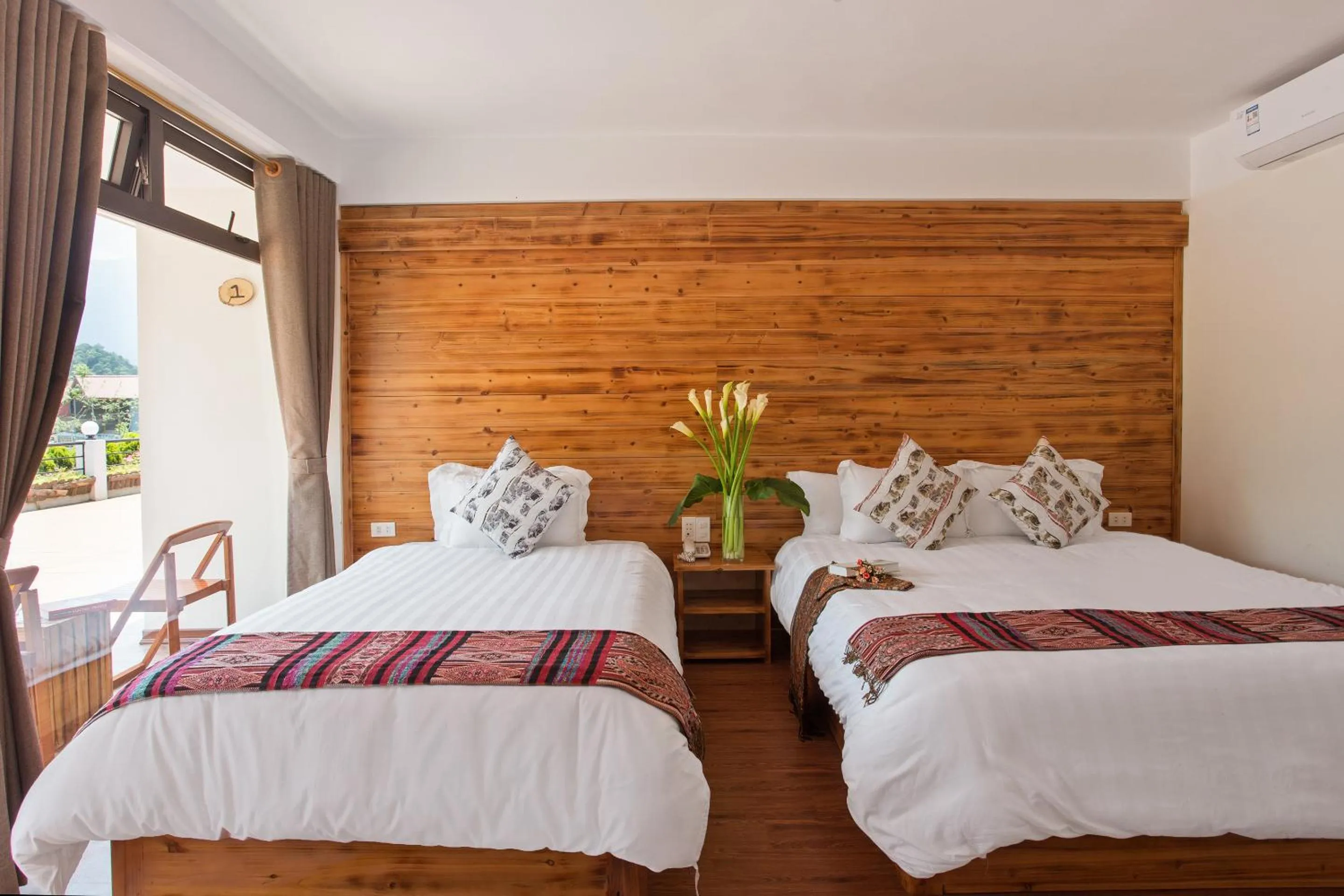 Bed in Sapa Village Hotel