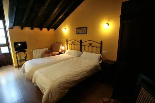 Bed in Hotel Rural Casa Cueto