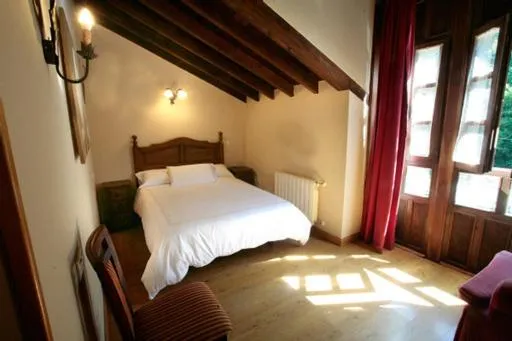 Bed in Hotel Rural Casa Cueto