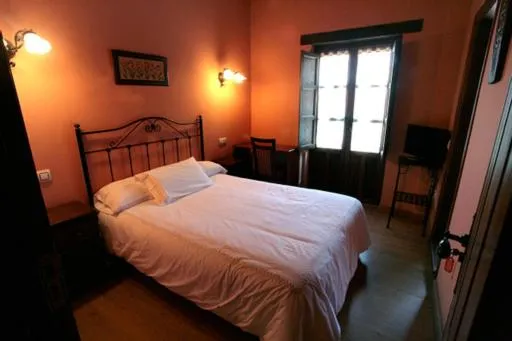 Bed in Hotel Rural Casa Cueto
