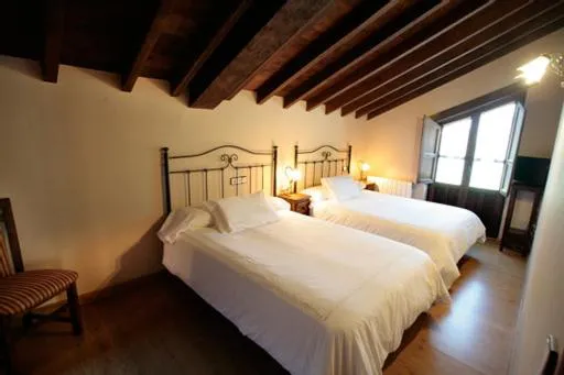 Bed in Hotel Rural Casa Cueto