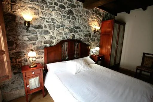 Bed in Hotel Rural Casa Cueto