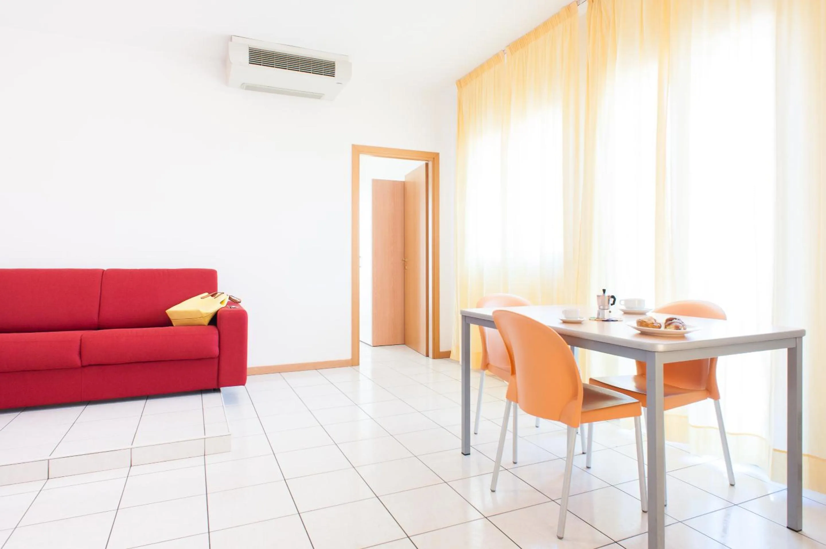 Living room in Welcome Residence per famiglie