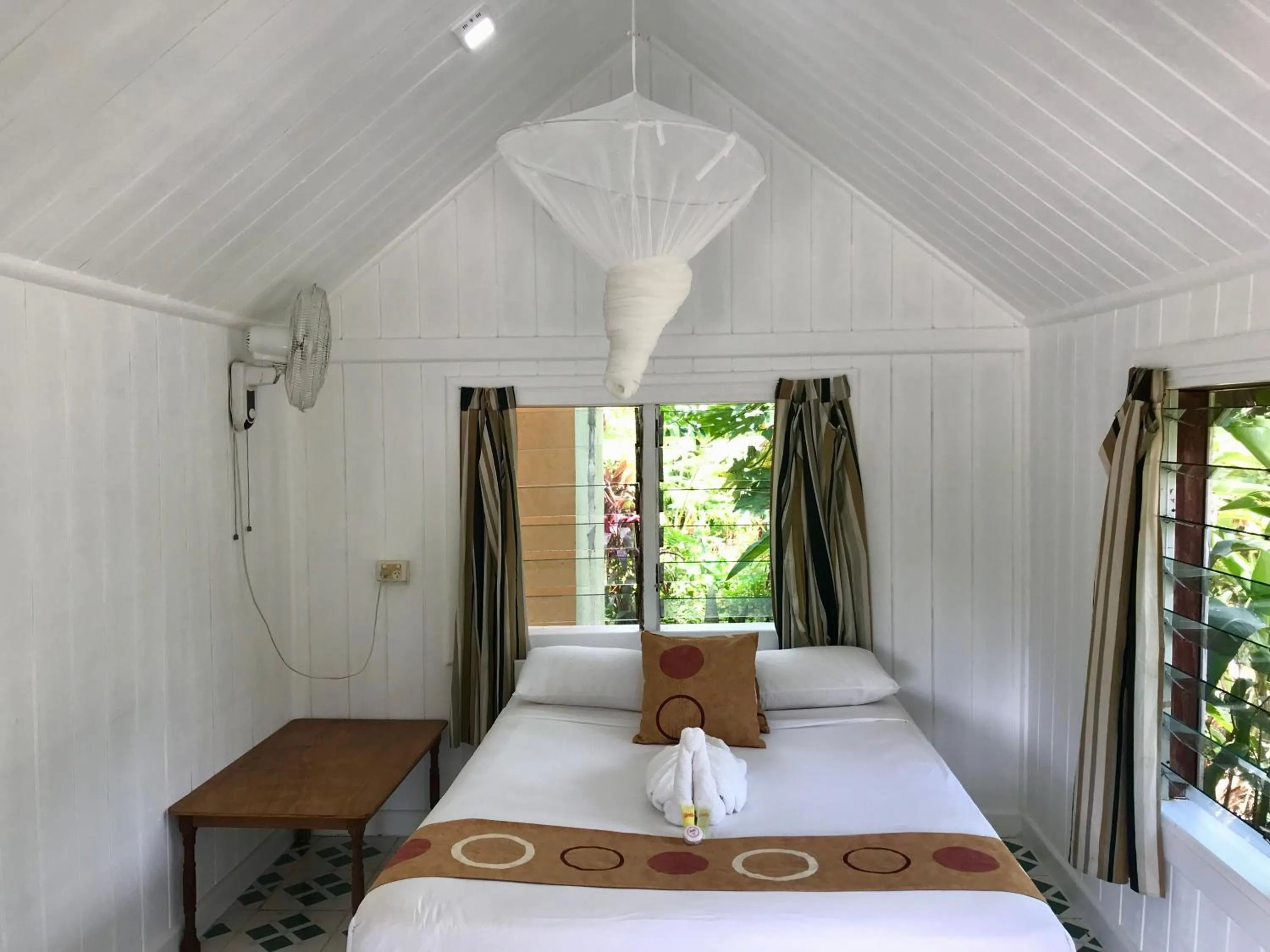 Bed in Tanna Evergreen Resort & Tours