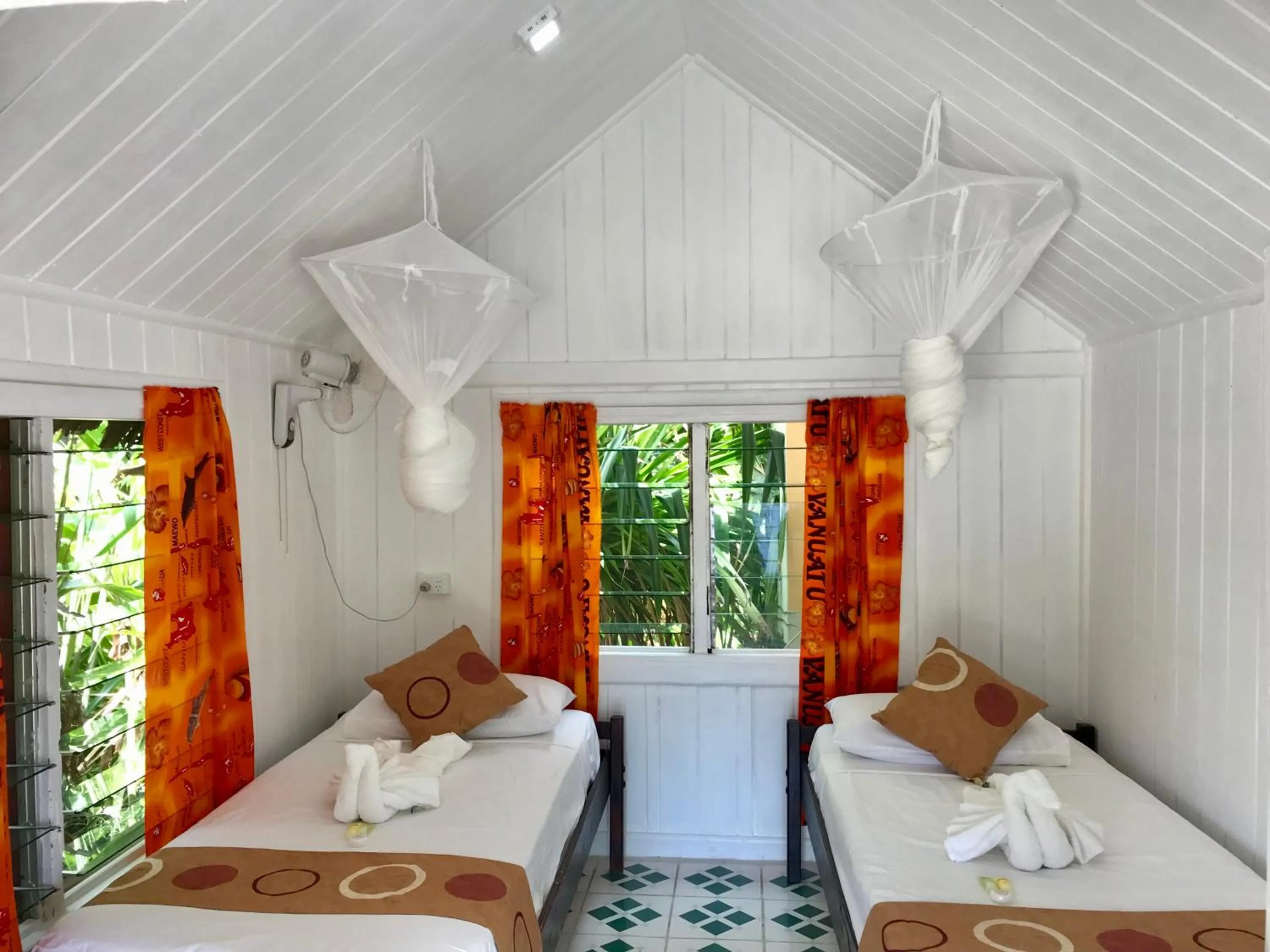 Bed in Tanna Evergreen Resort & Tours