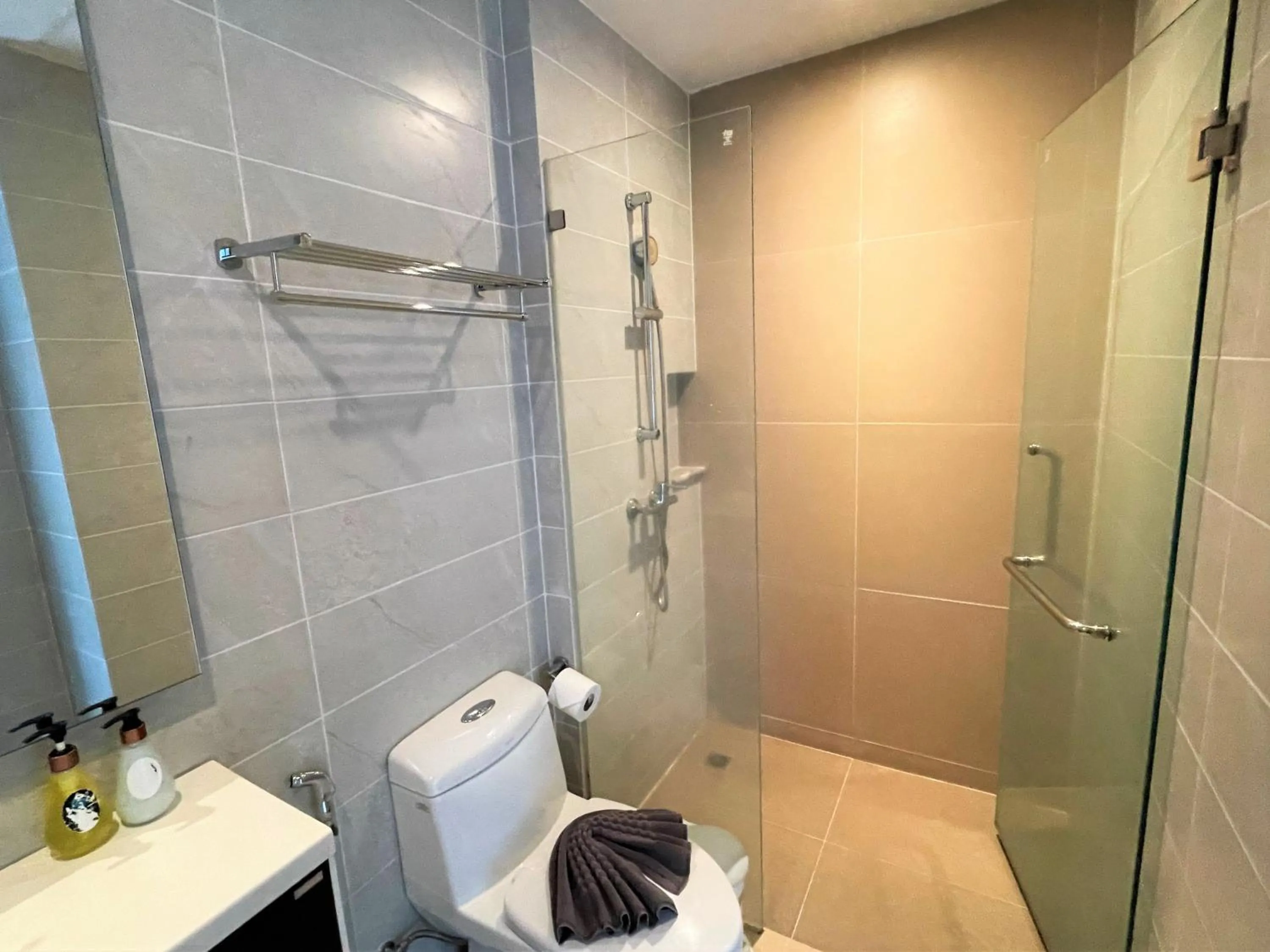 Shower in Emerald Terrace Apartments by Lofty