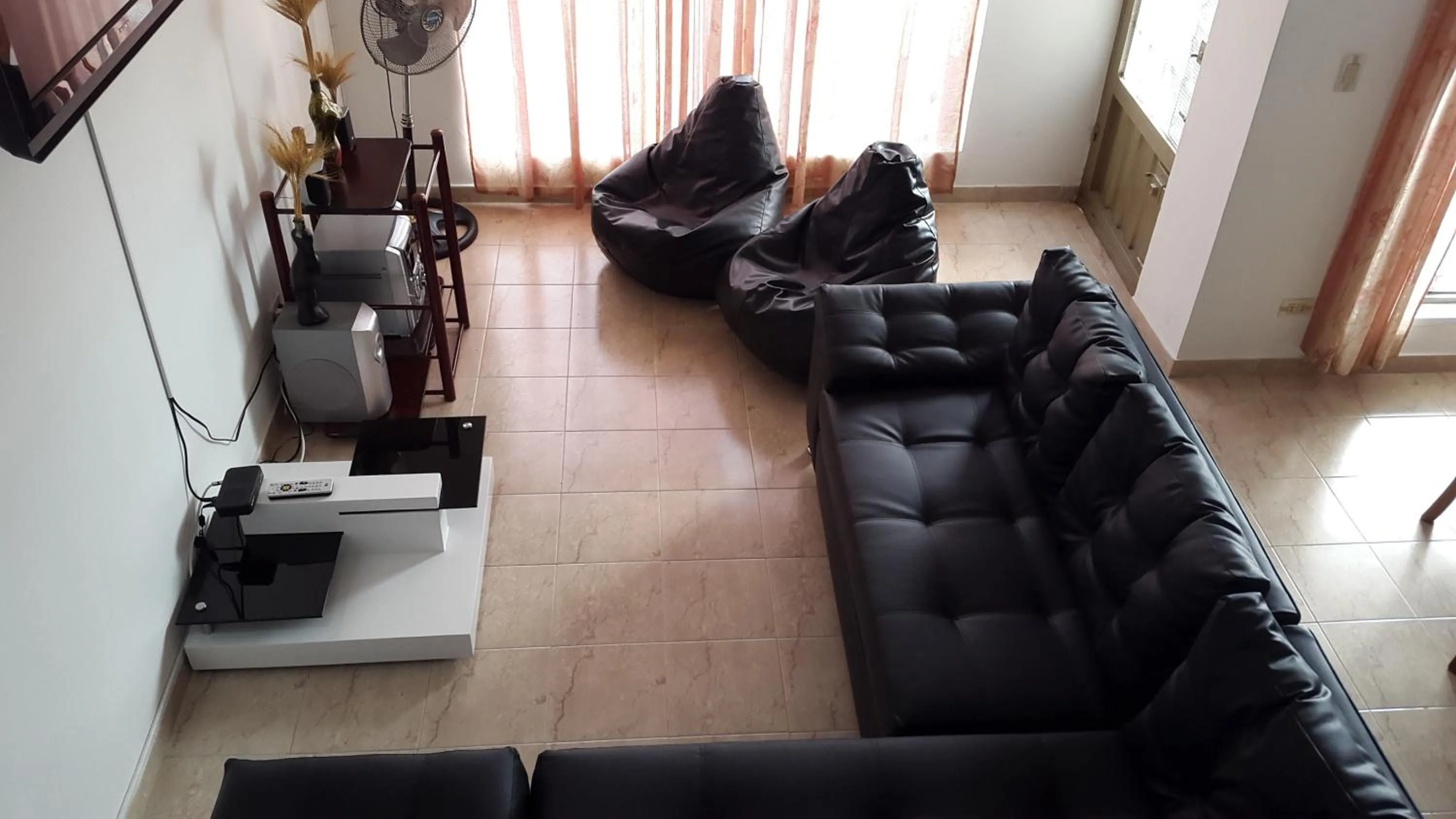 Communal lounge/ TV room in Casa con Piscina Privada y Jacuzzi