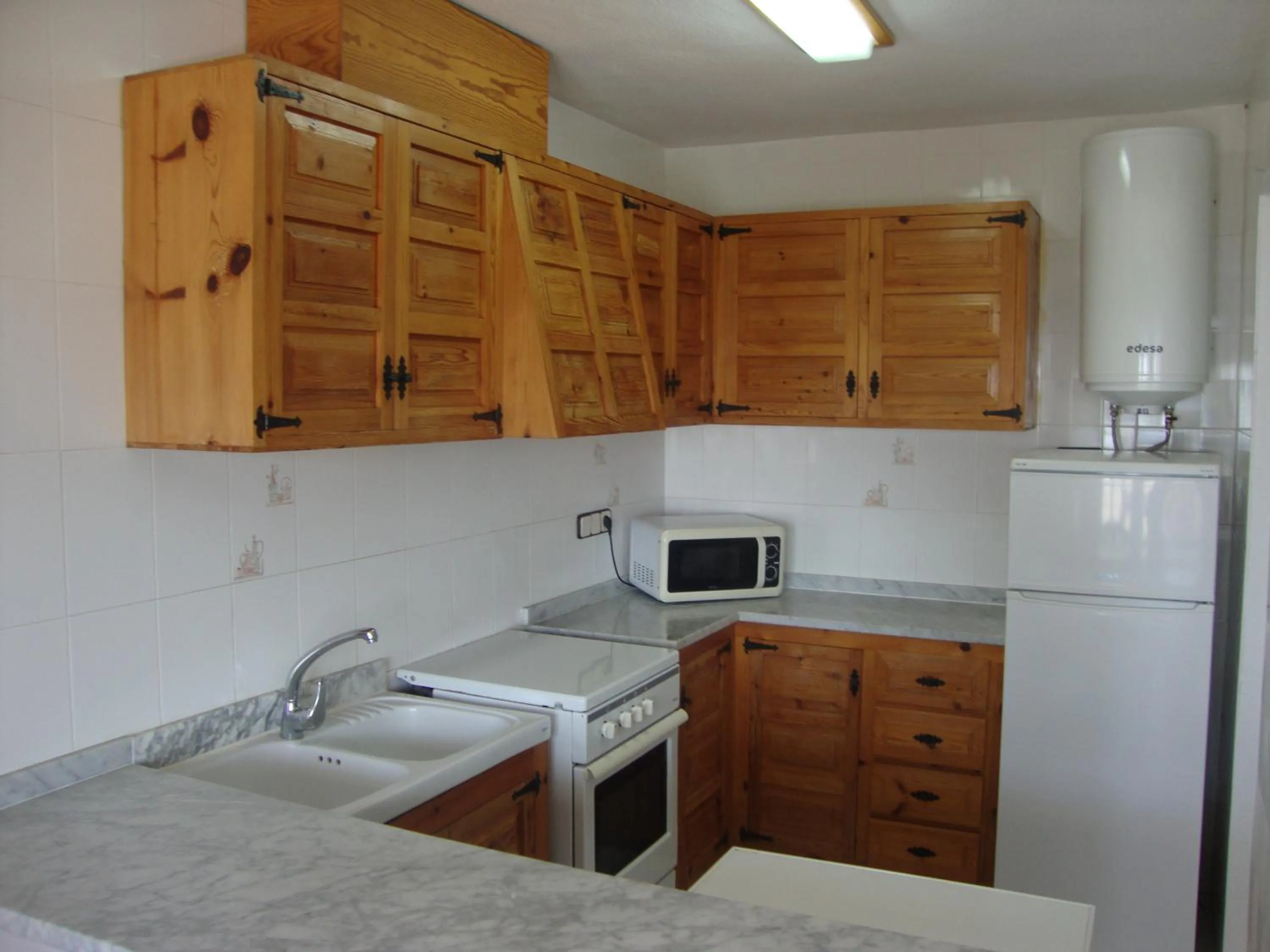 Kitchen or kitchenette in Alquileres Cap y Corp