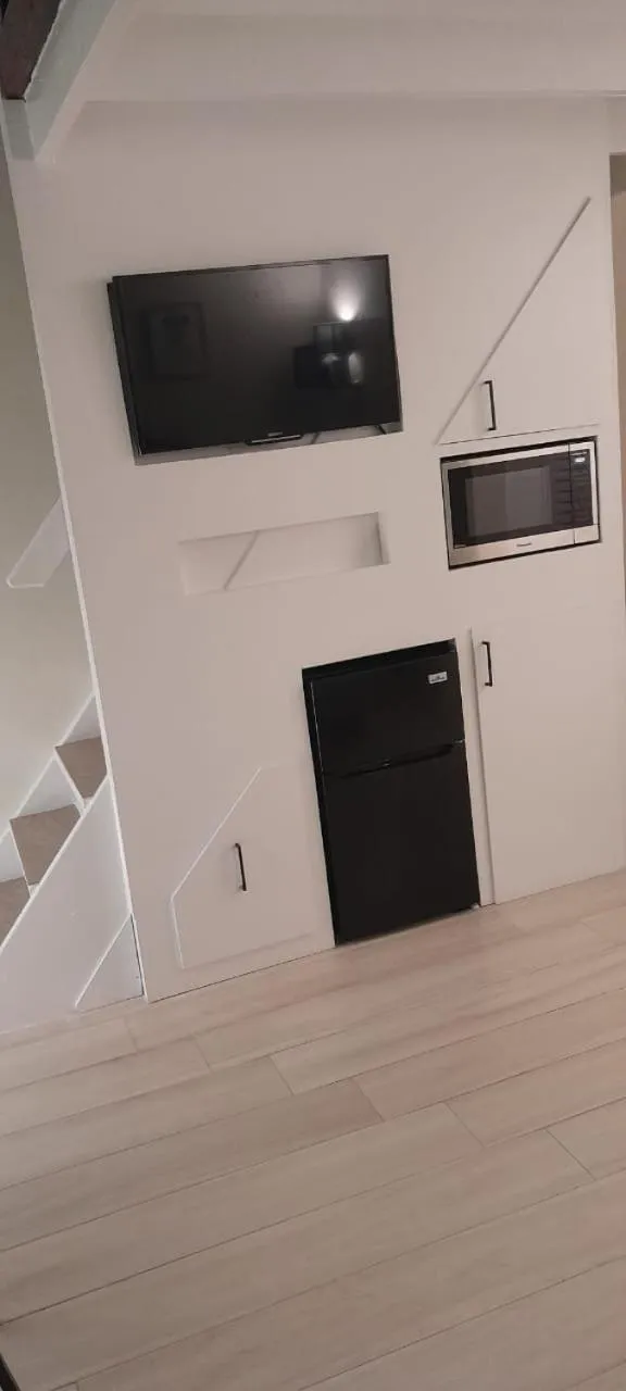 Communal lounge/ TV room in Deluxe SandCastles Condos