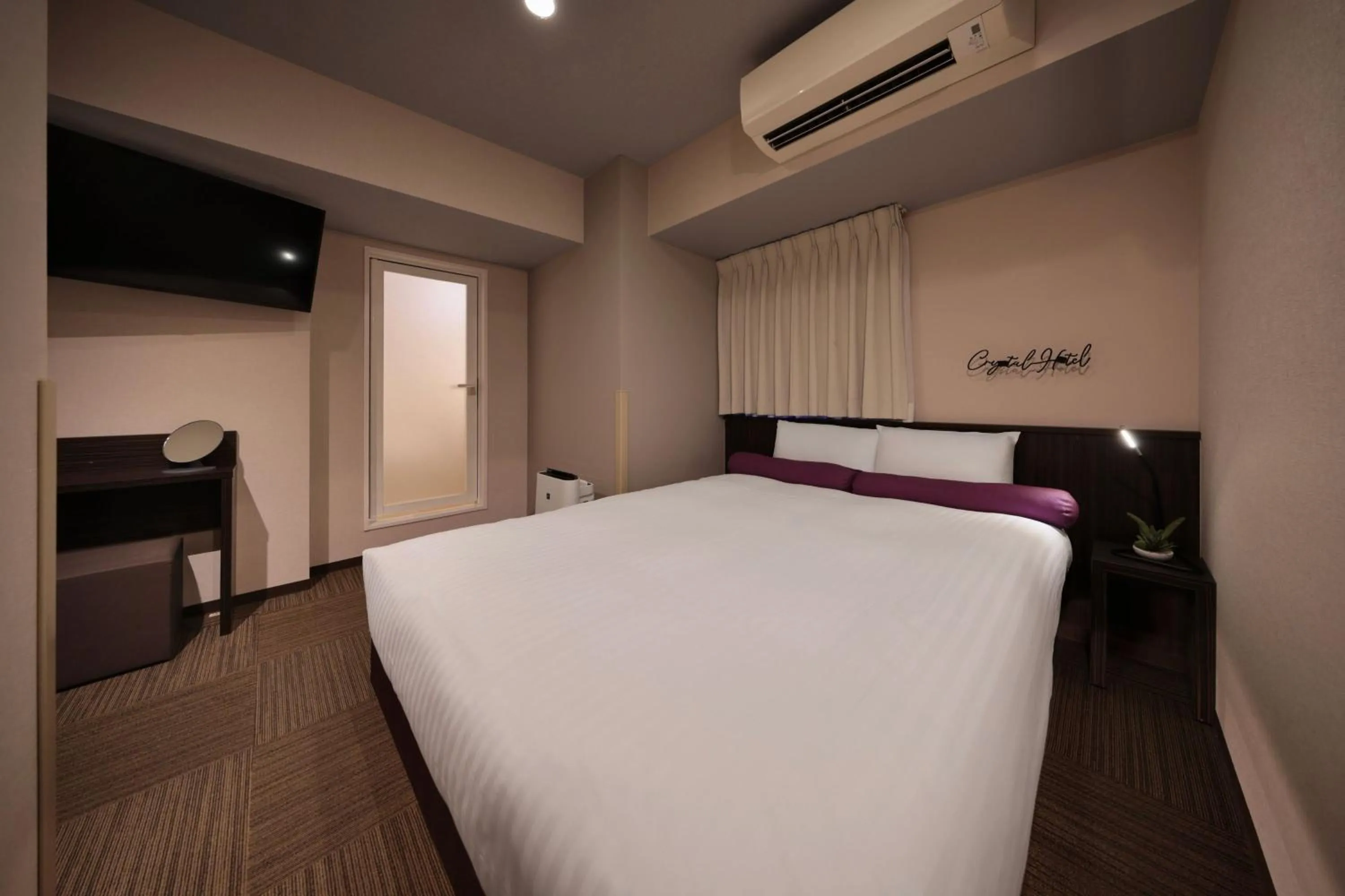 Bed in Nipponbashi Crystal Hotel