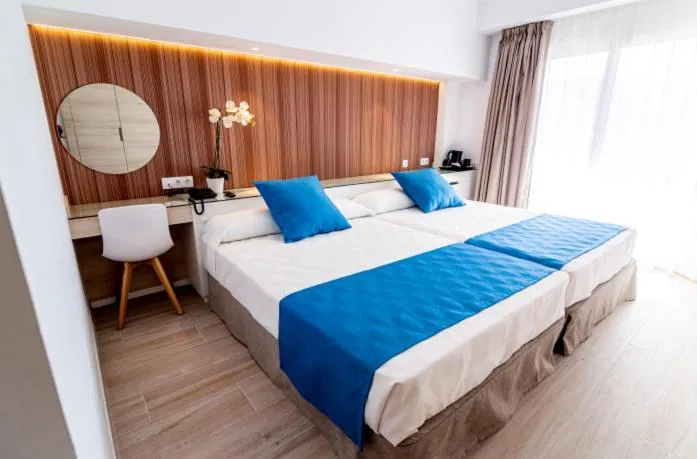 Bed in Hotel Rosamar