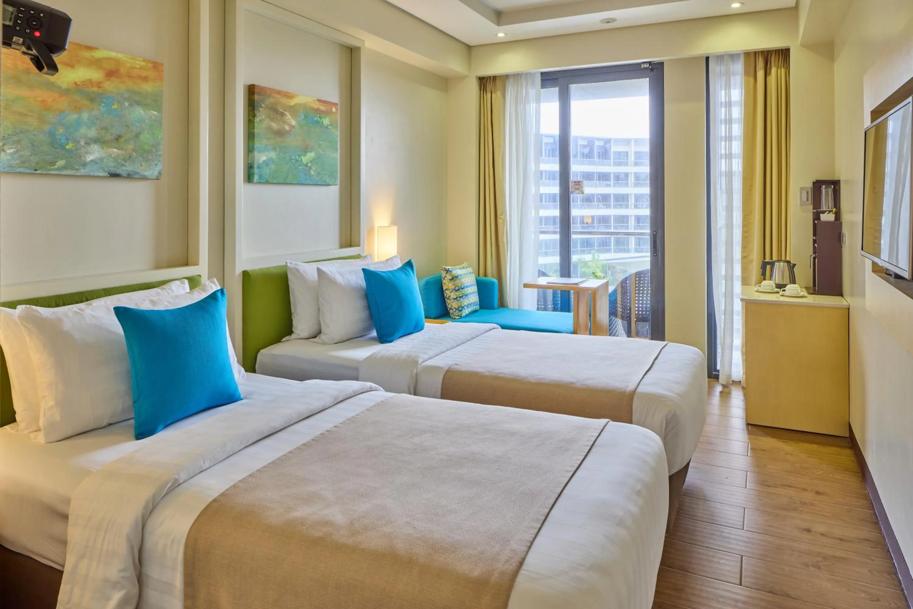 Bed in Savoy Hotel Boracay near Newcoast Beach