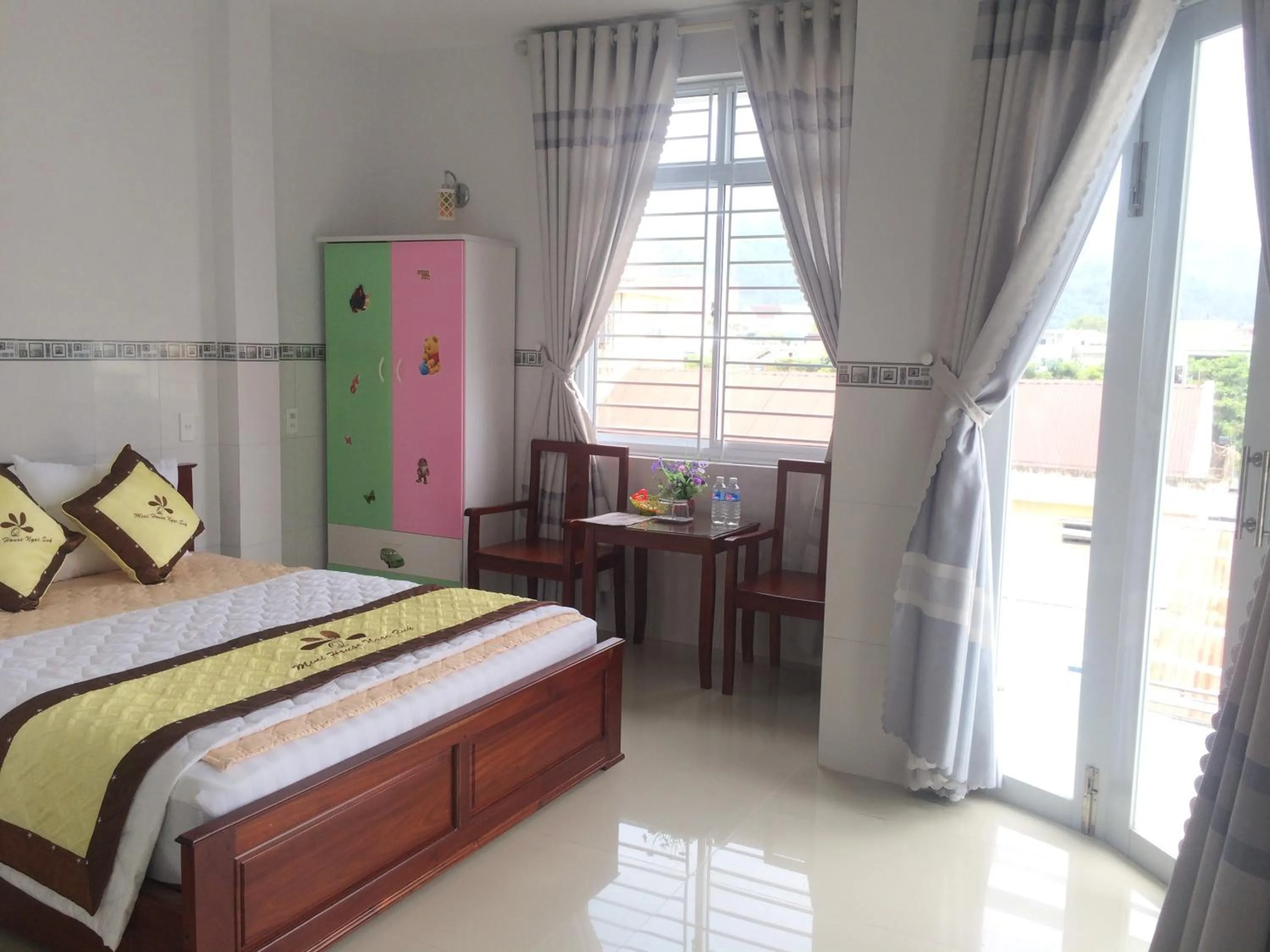 Photo of the whole room, Bed in NGỌC QUÝ Mini House