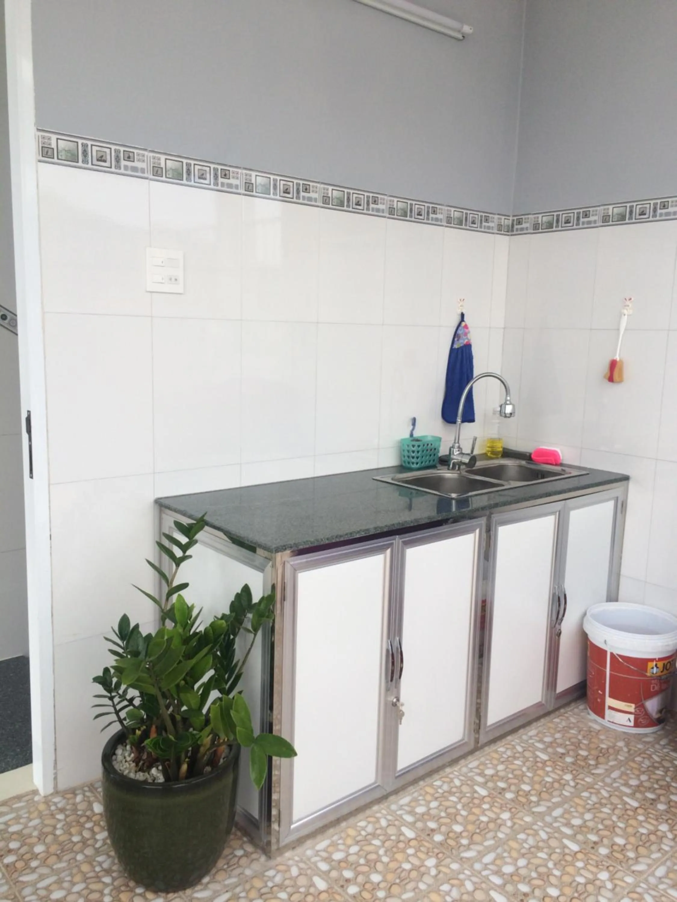 Kitchen or kitchenette in NGỌC QUÝ Mini House