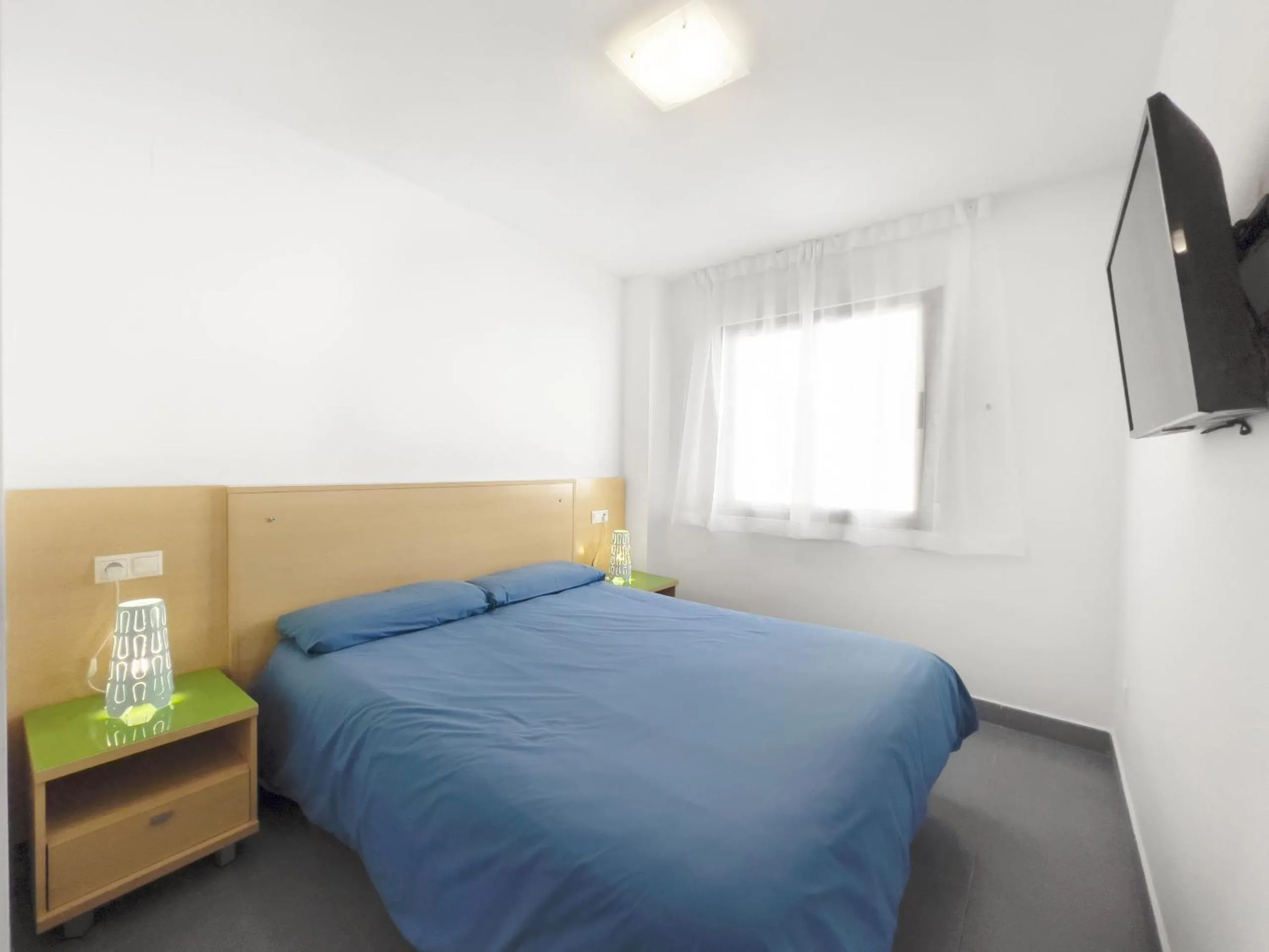 Bed in Apartamentos Hipocampos Calpe Rent Apart