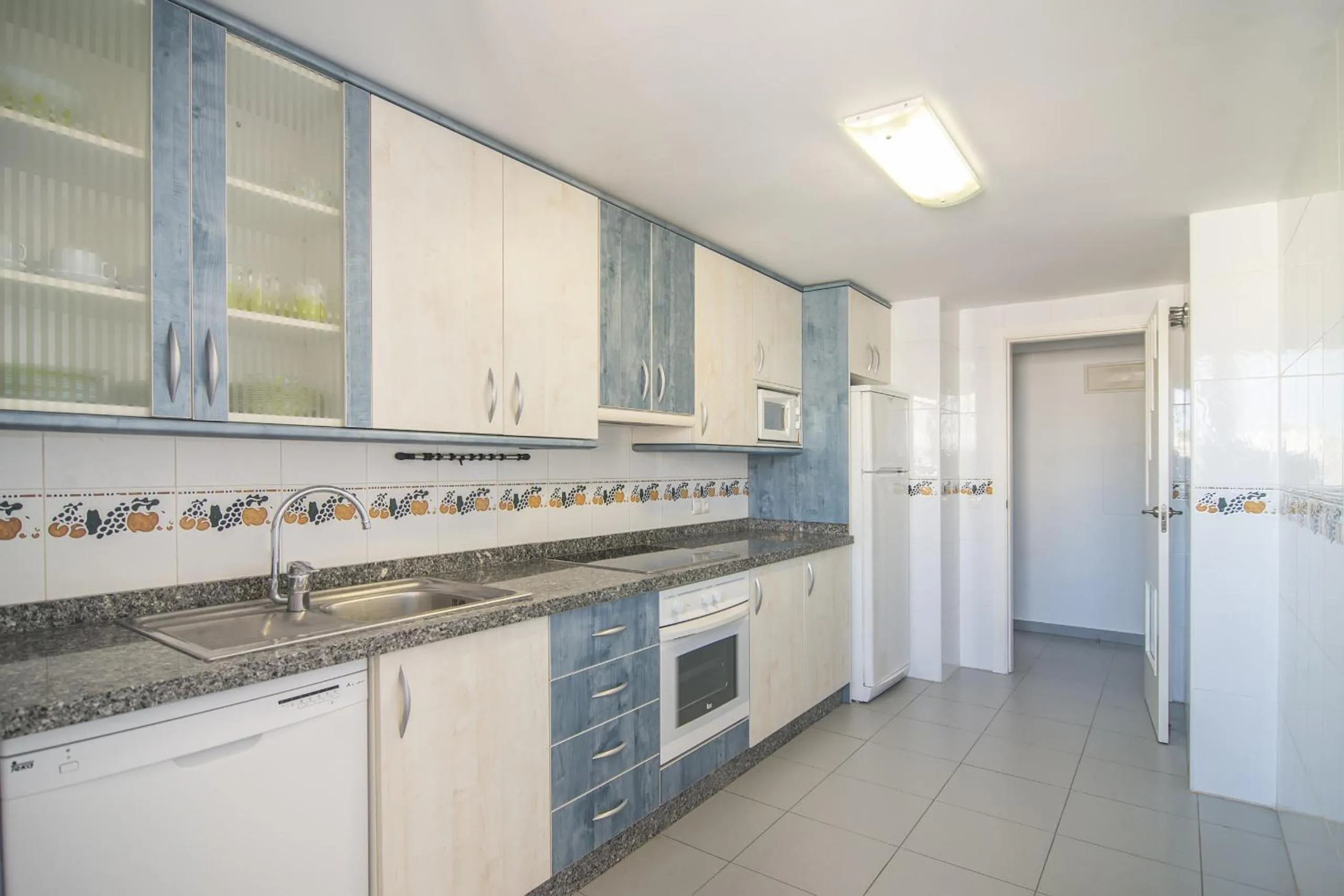 Kitchen or kitchenette in Apartamentos Hipocampos Calpe Rent Apart