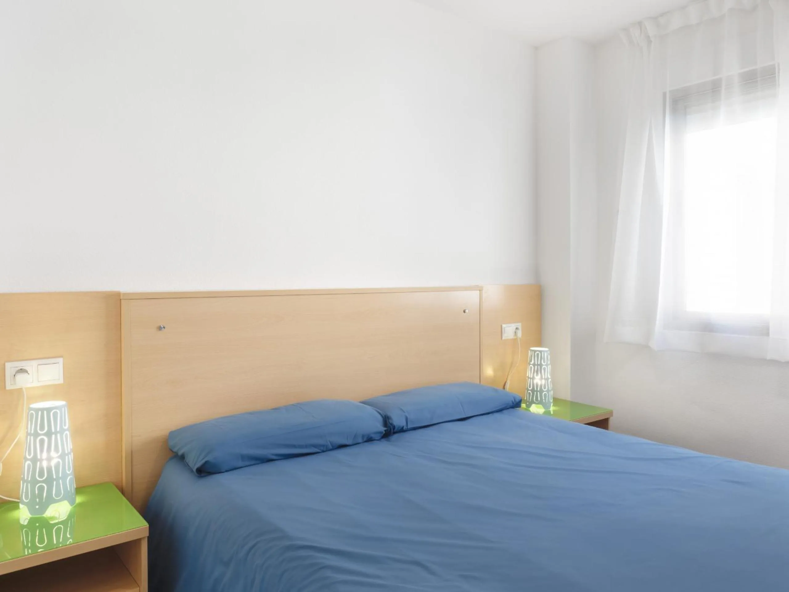 Bed in Apartamentos Hipocampos Calpe Rent Apart