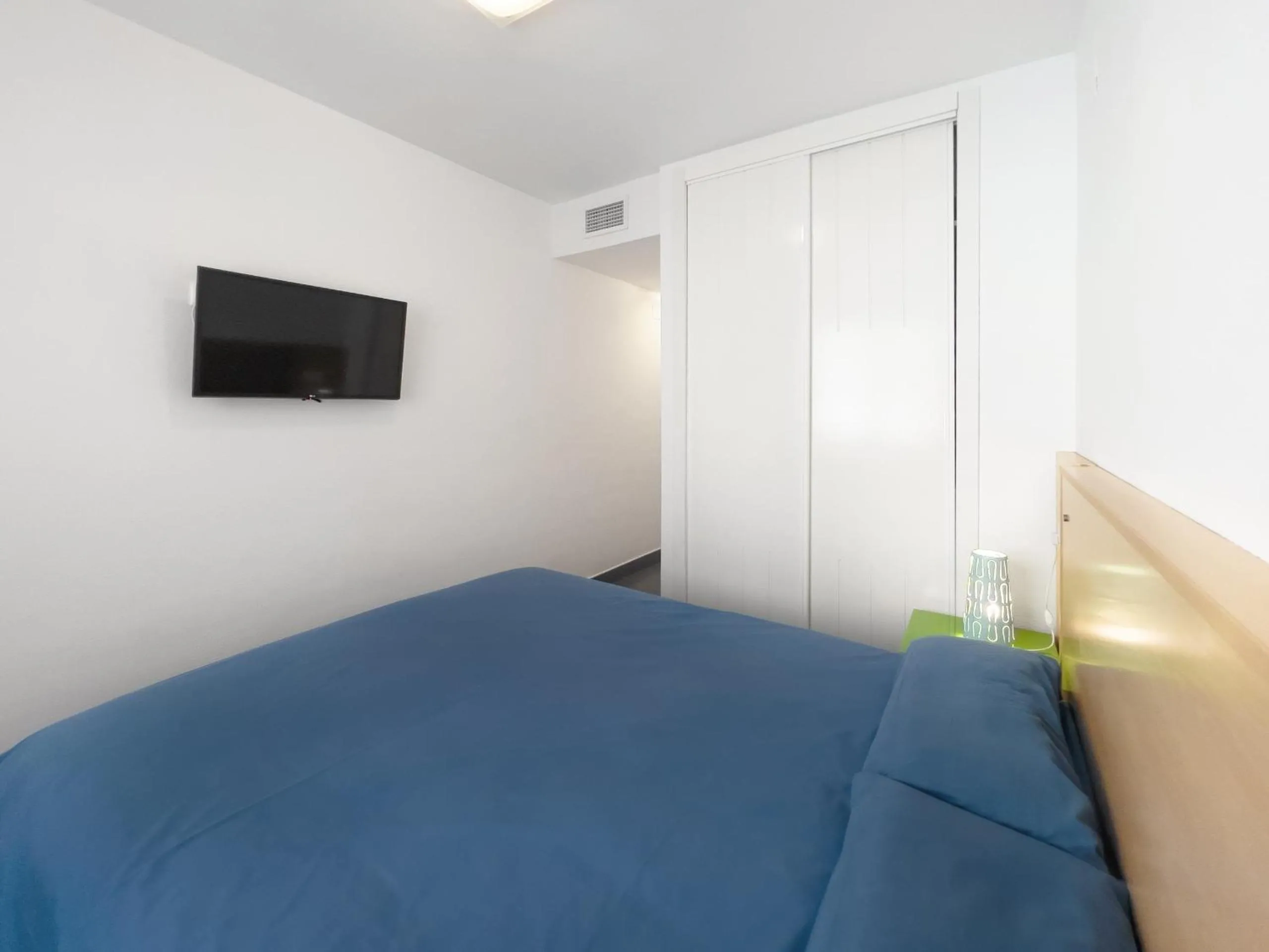 Bed in Apartamentos Hipocampos Calpe Rent Apart