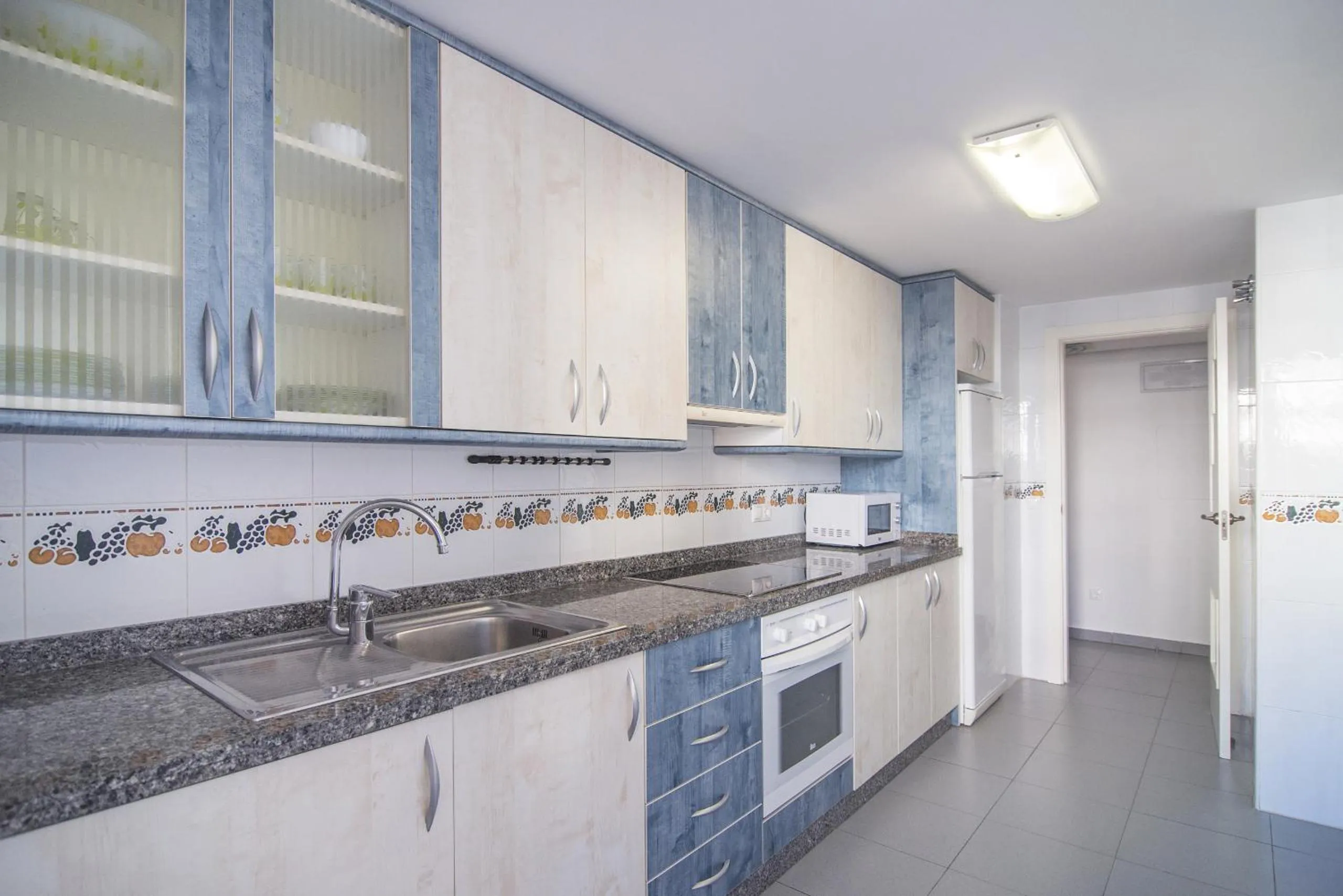 Kitchen or kitchenette in Apartamentos Hipocampos Calpe Rent Apart