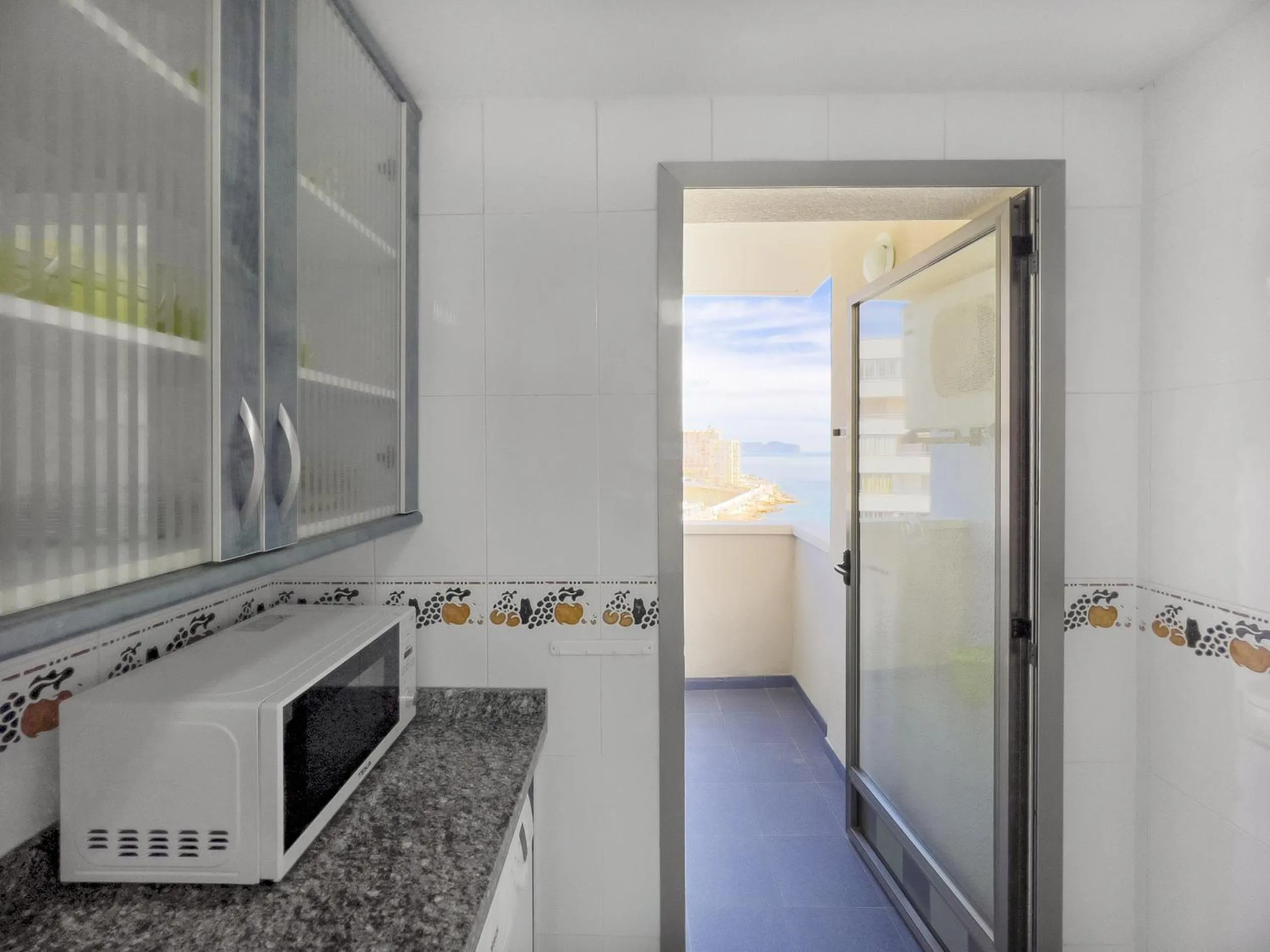 Kitchen or kitchenette in Apartamentos Hipocampos Calpe Rent Apart
