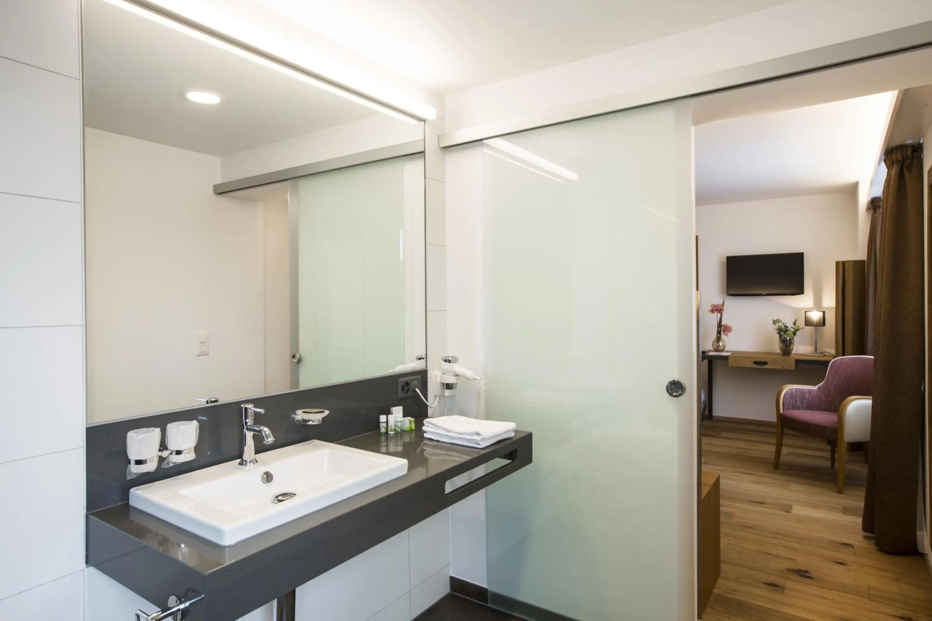 Bathroom in Romantik Hotel le Vignier