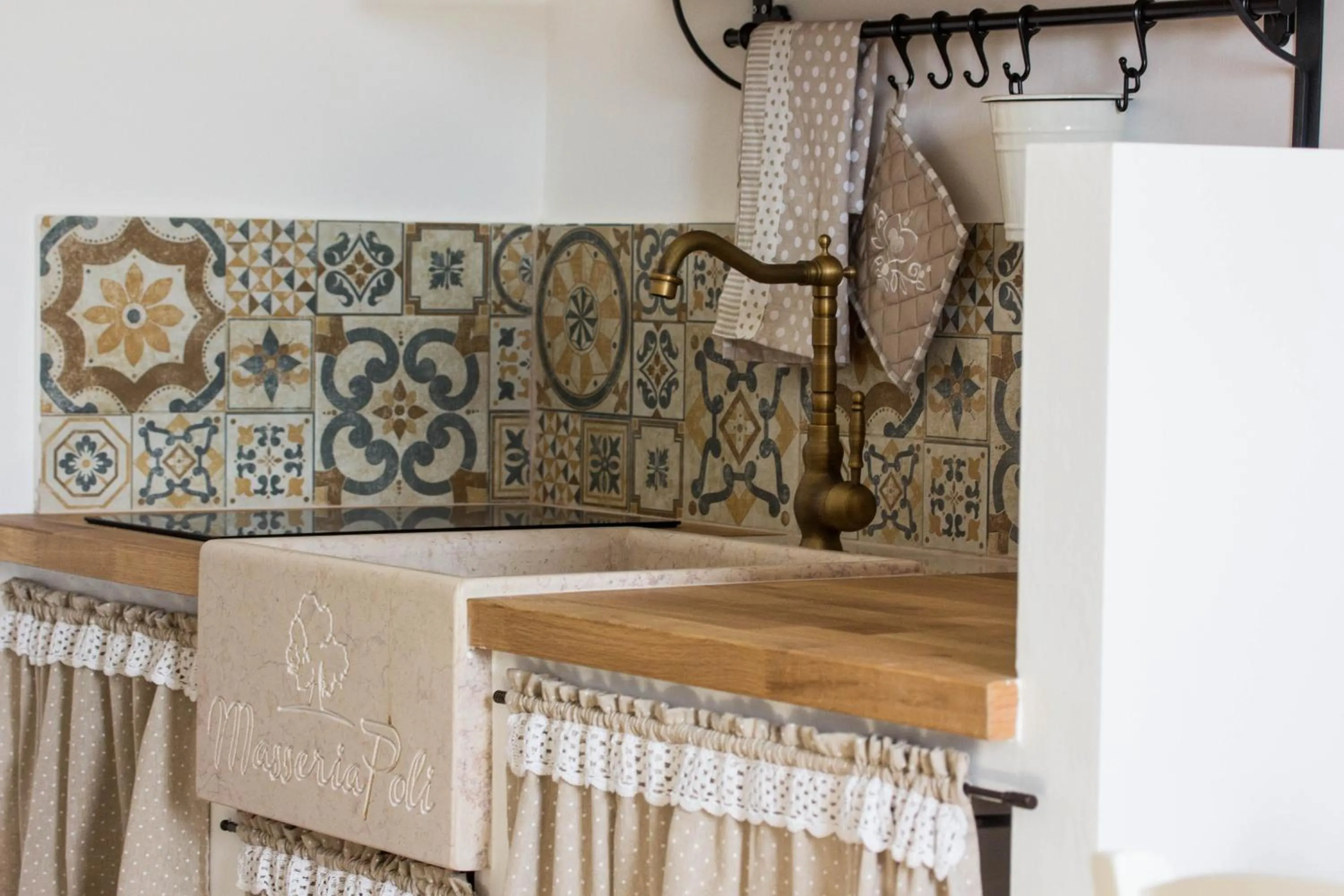 Kitchen or kitchenette in Masseria Poli Country House