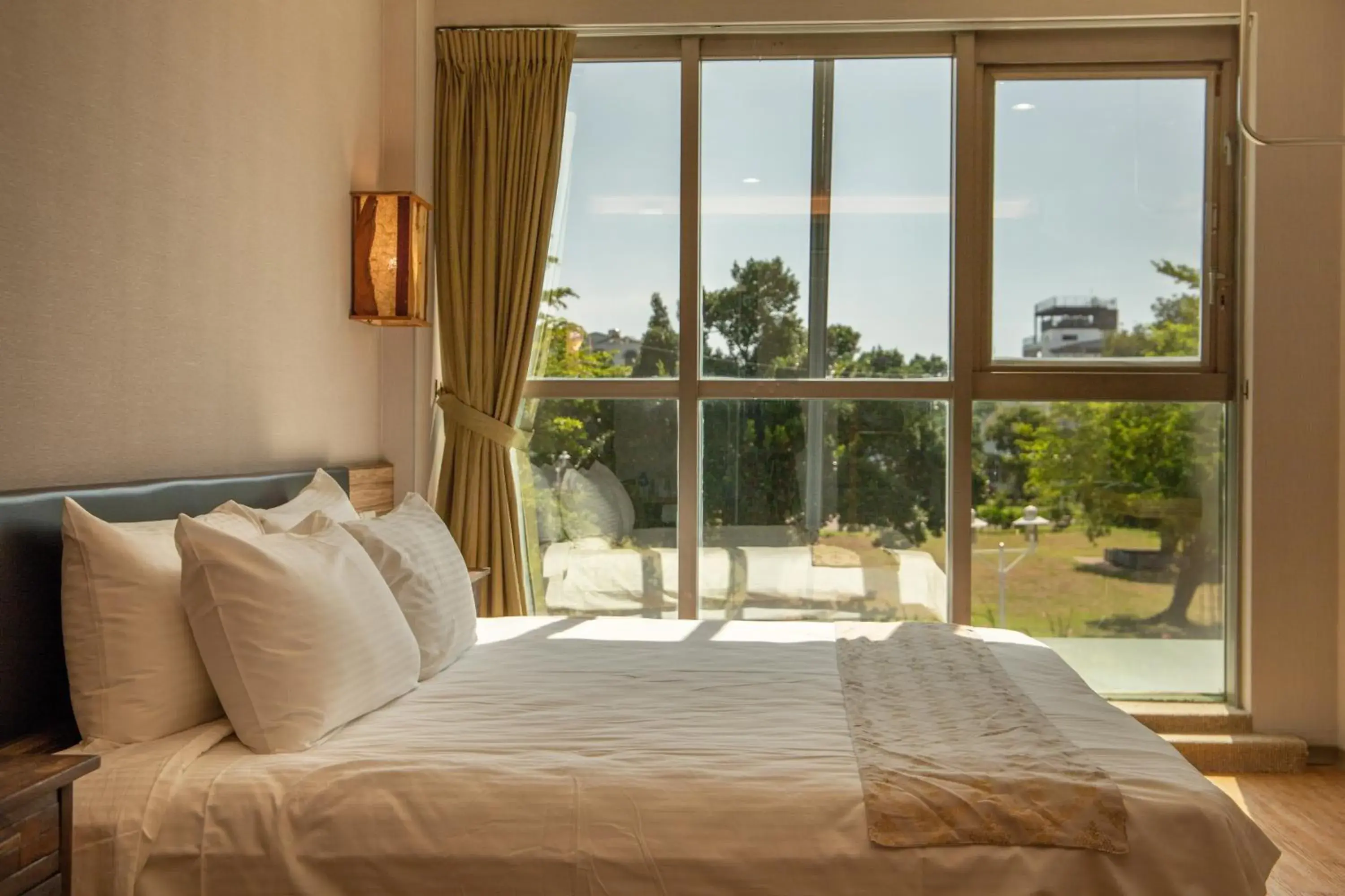 Photo of the whole room, Bed in TAINAN JULIE'S GARDEN