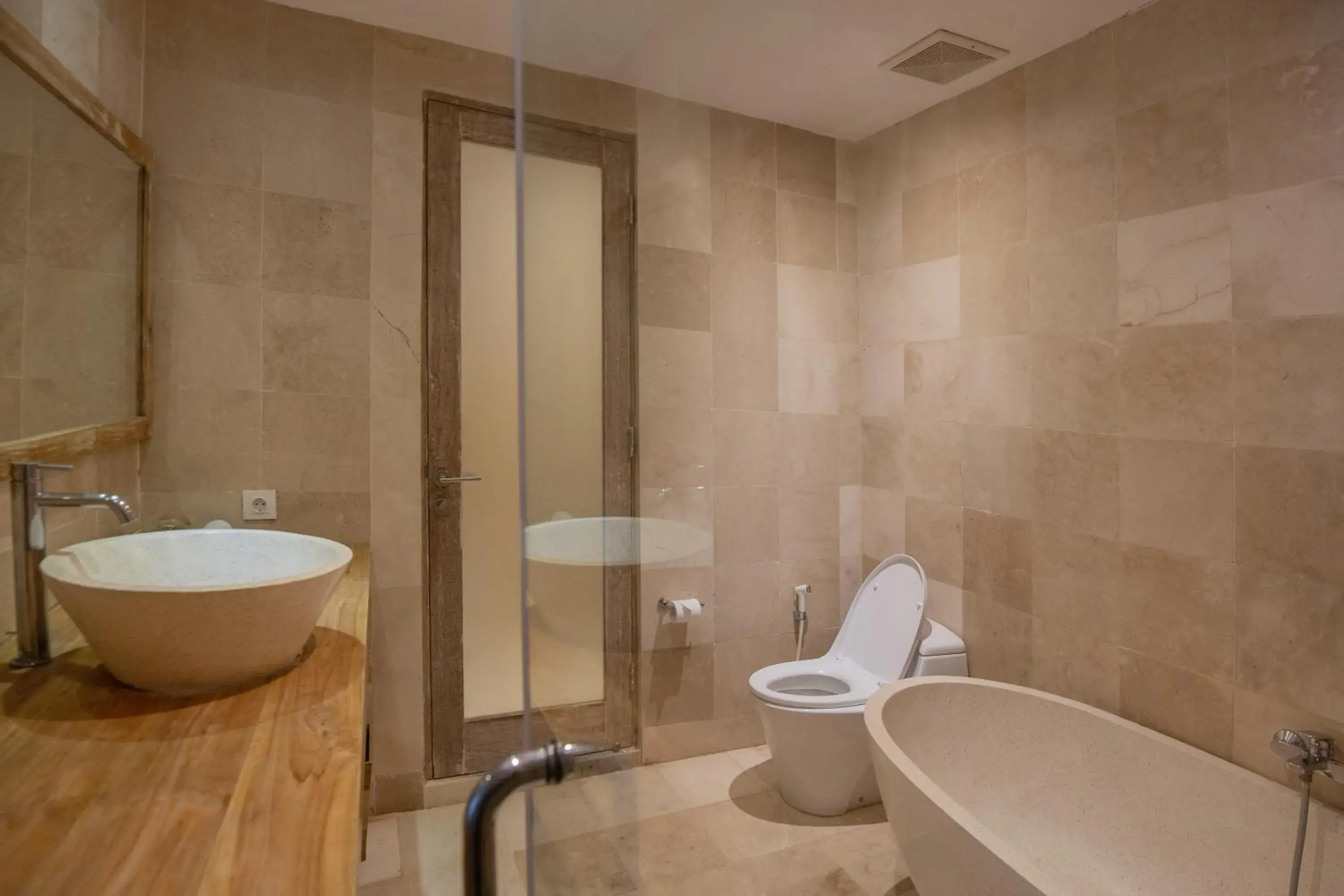 Bathroom in La Berceuse Resort and Villa Nusa Dua by Taritiya Collection Bathroom in La Berceuse Resort and Villa Nusa Dua by Taritiya Collection