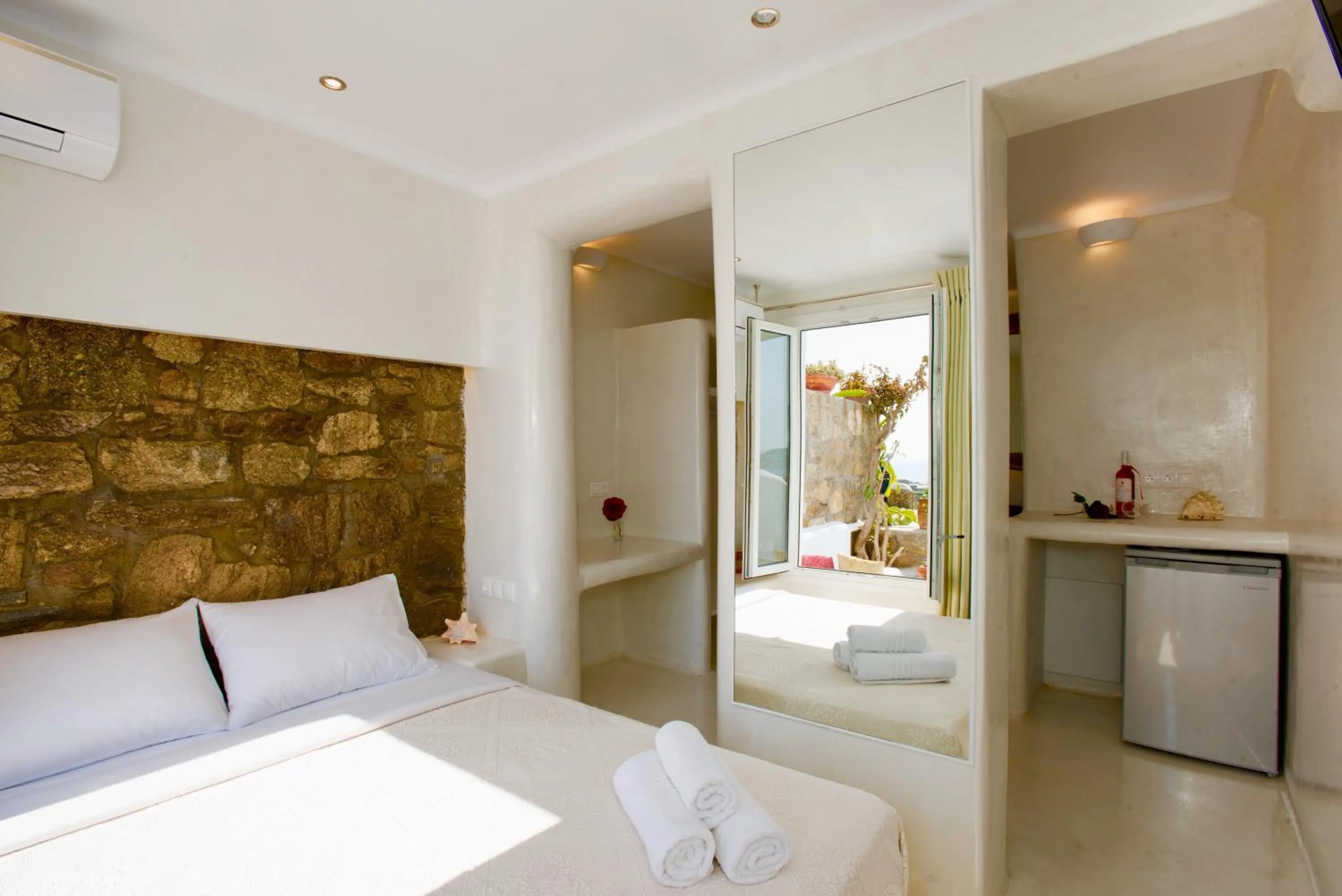 Decorative detail, Bed in Villa Elina suites and more