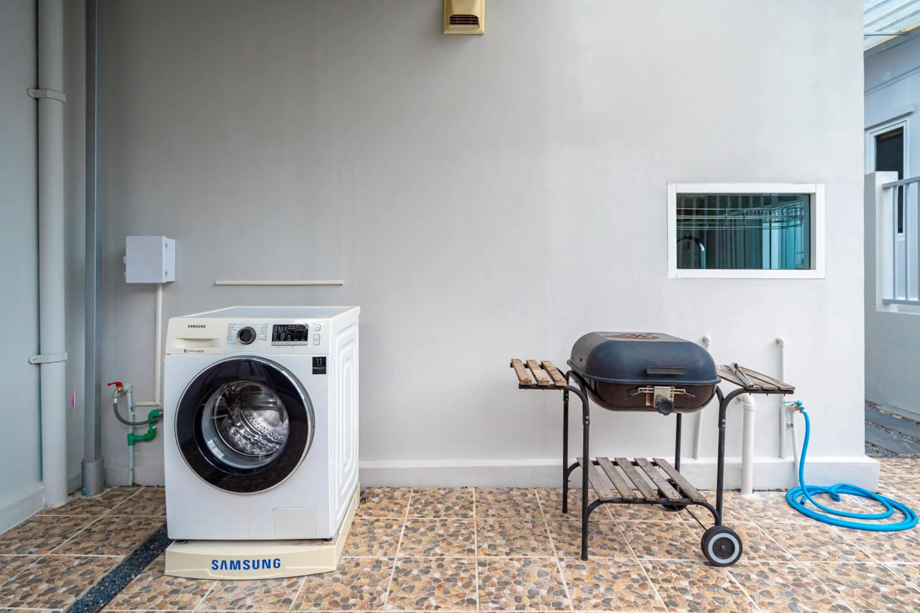 washing machine in The Orchid Villa