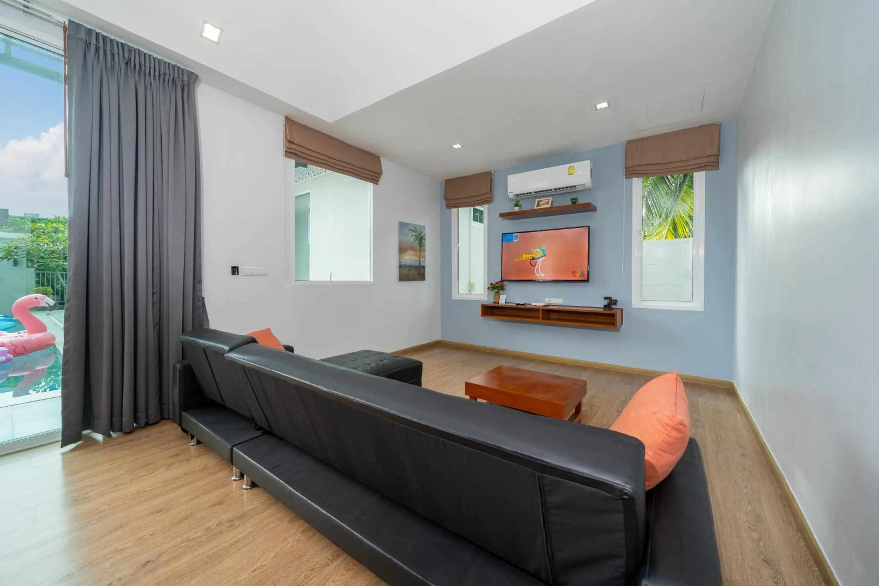 Communal lounge/ TV room in Phuket La Siesta Pool Villas & Pool Access Rooms