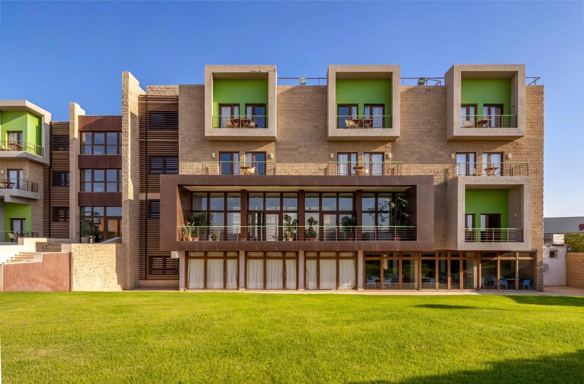 Property building in Dhara Residence E2 Lodge Hotel