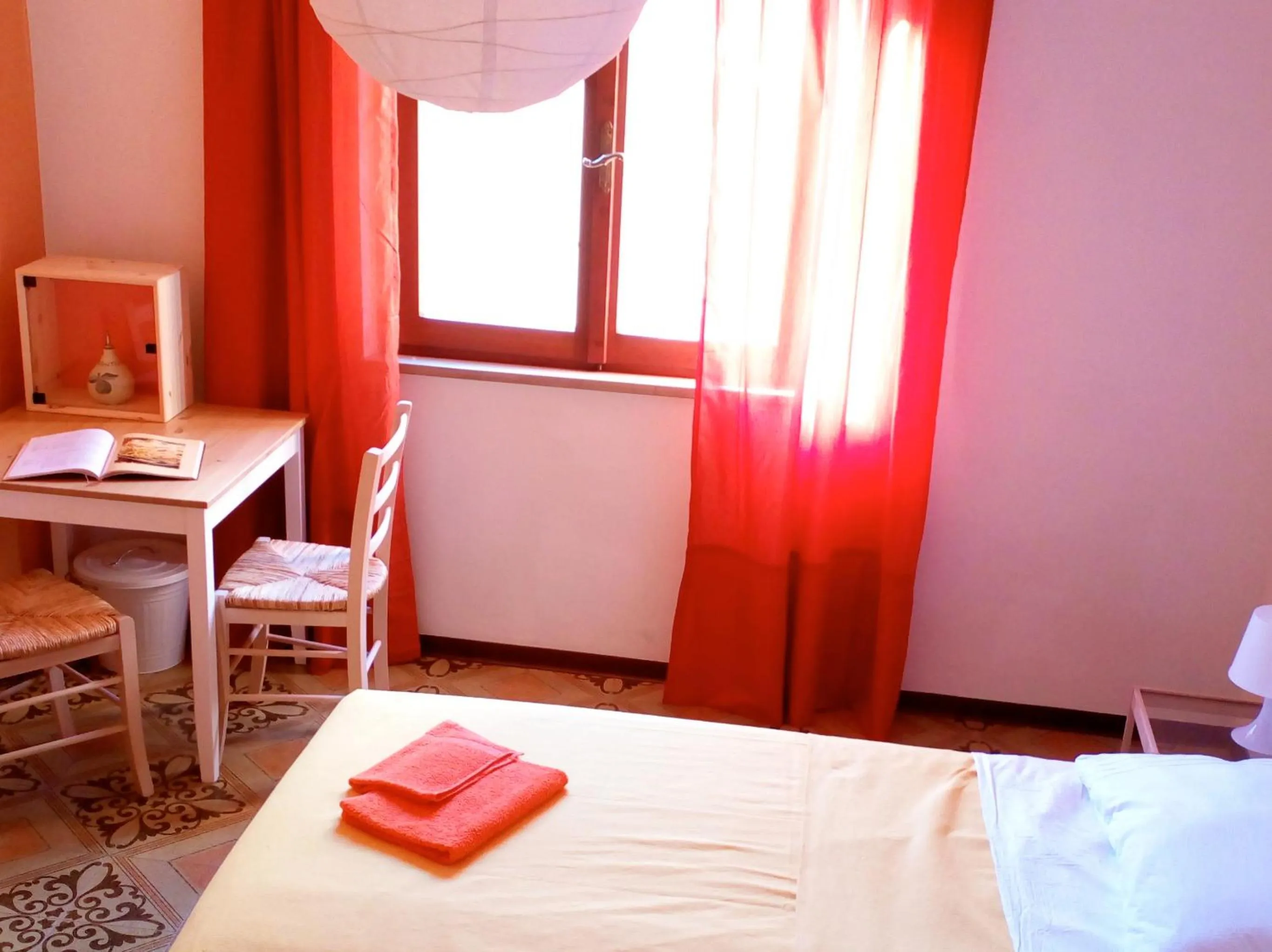 Photo of the whole room, Bed in Casa "Le tre Muse"