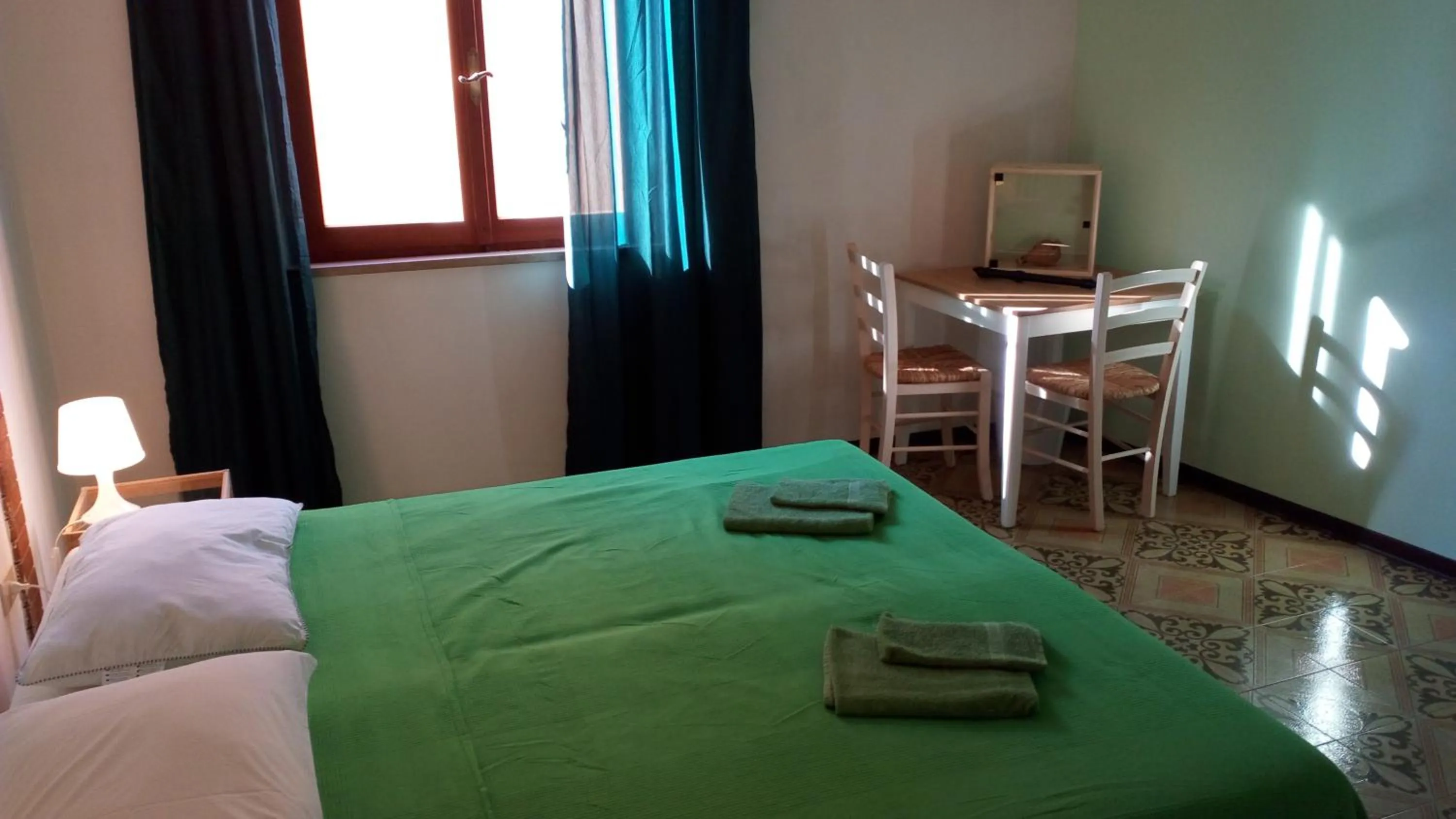 Photo of the whole room, Bed in Casa "Le tre Muse"