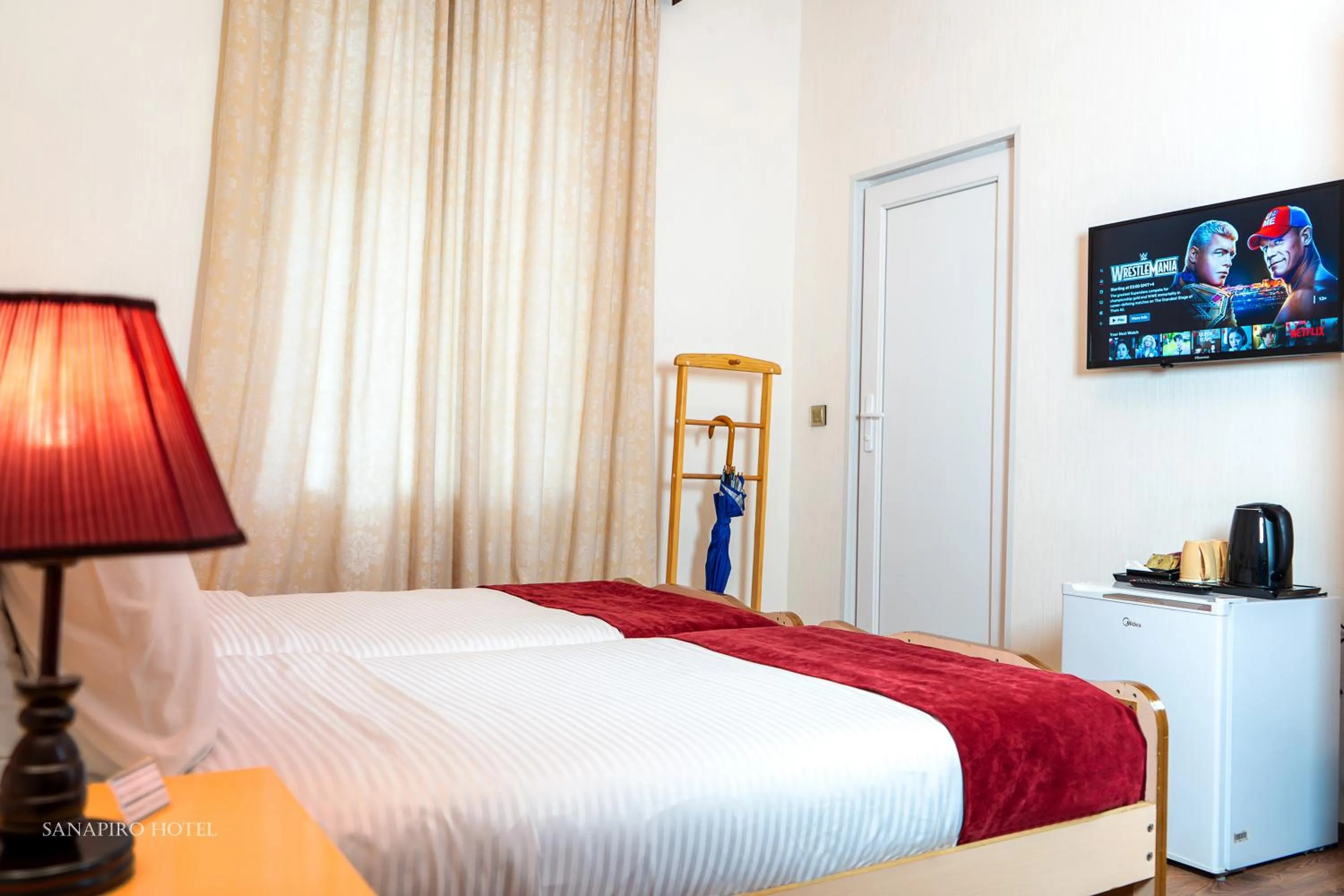 Bed in Sanapiro Hotel