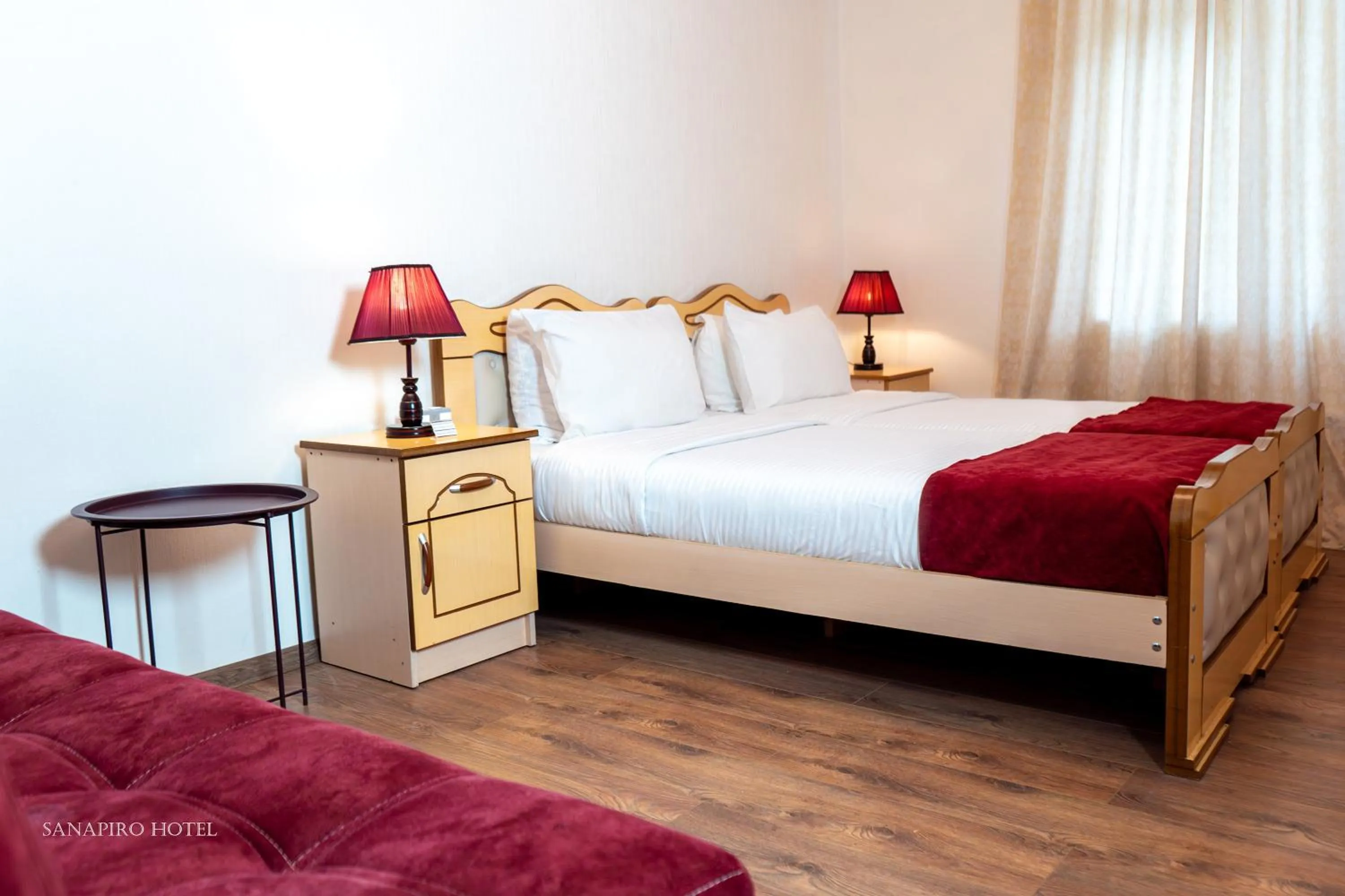 Bed in Sanapiro Hotel
