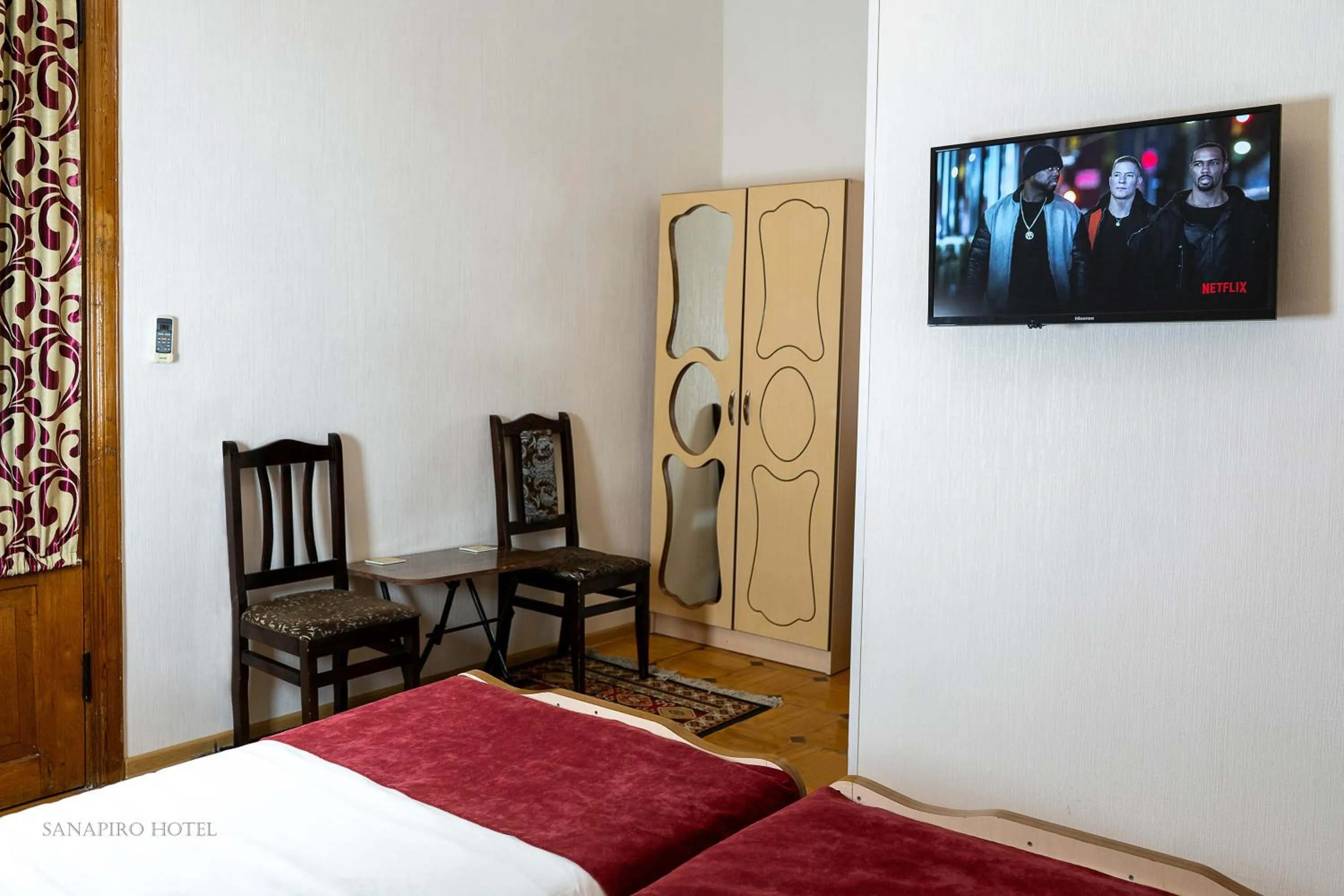 Bed in Sanapiro Hotel