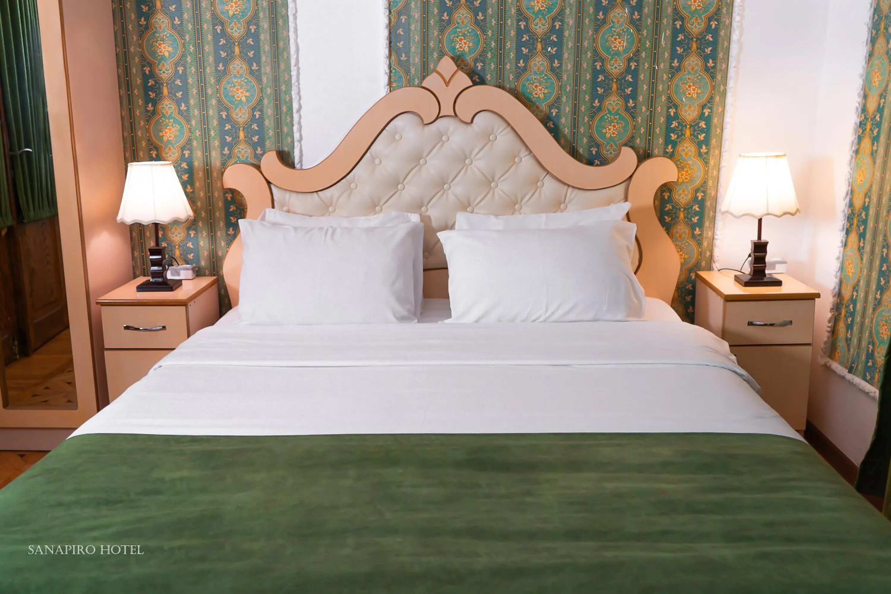 Bed in Sanapiro Hotel