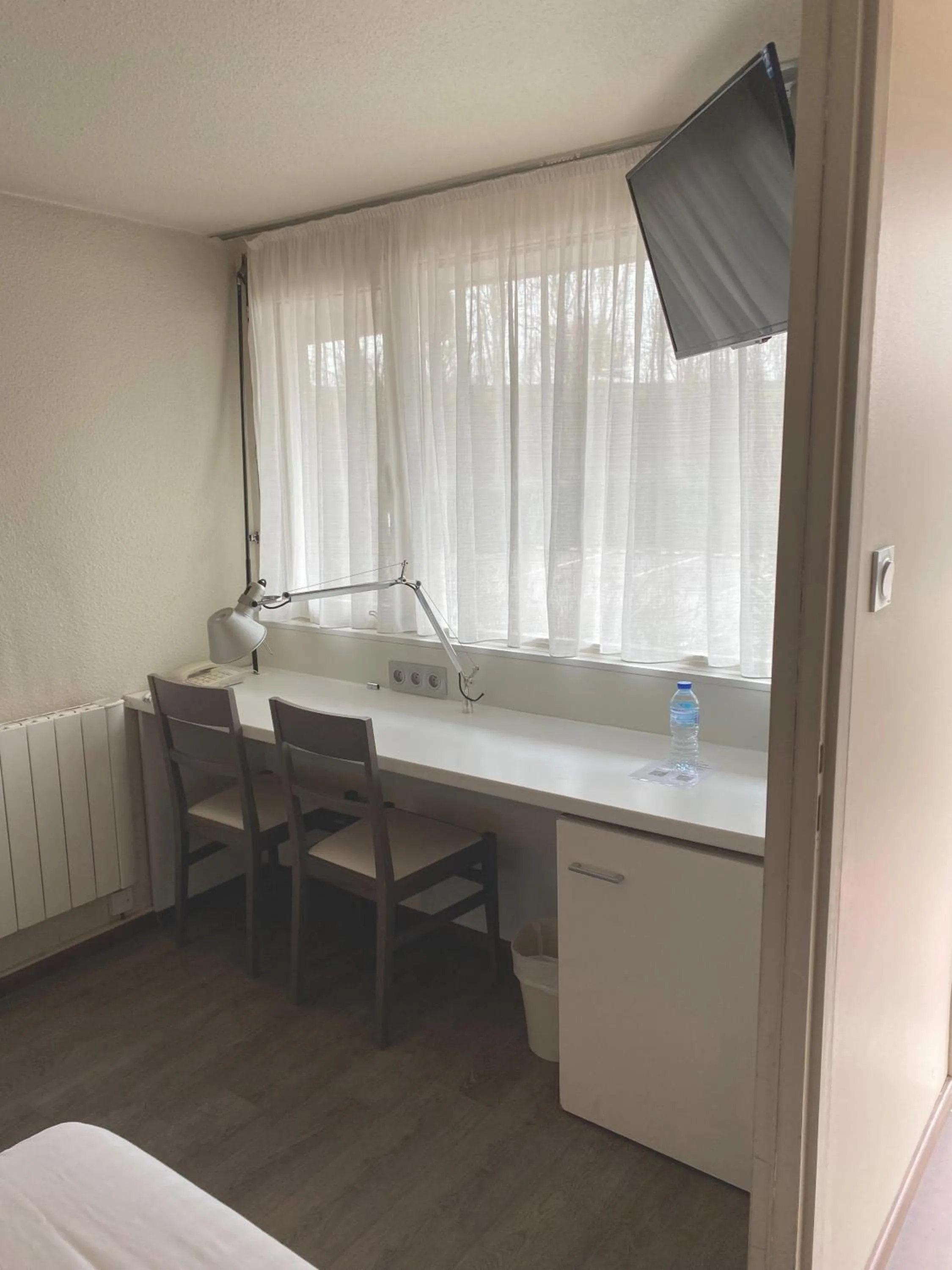 Seating area in Brit Hotel Confort Nancy Lunéville